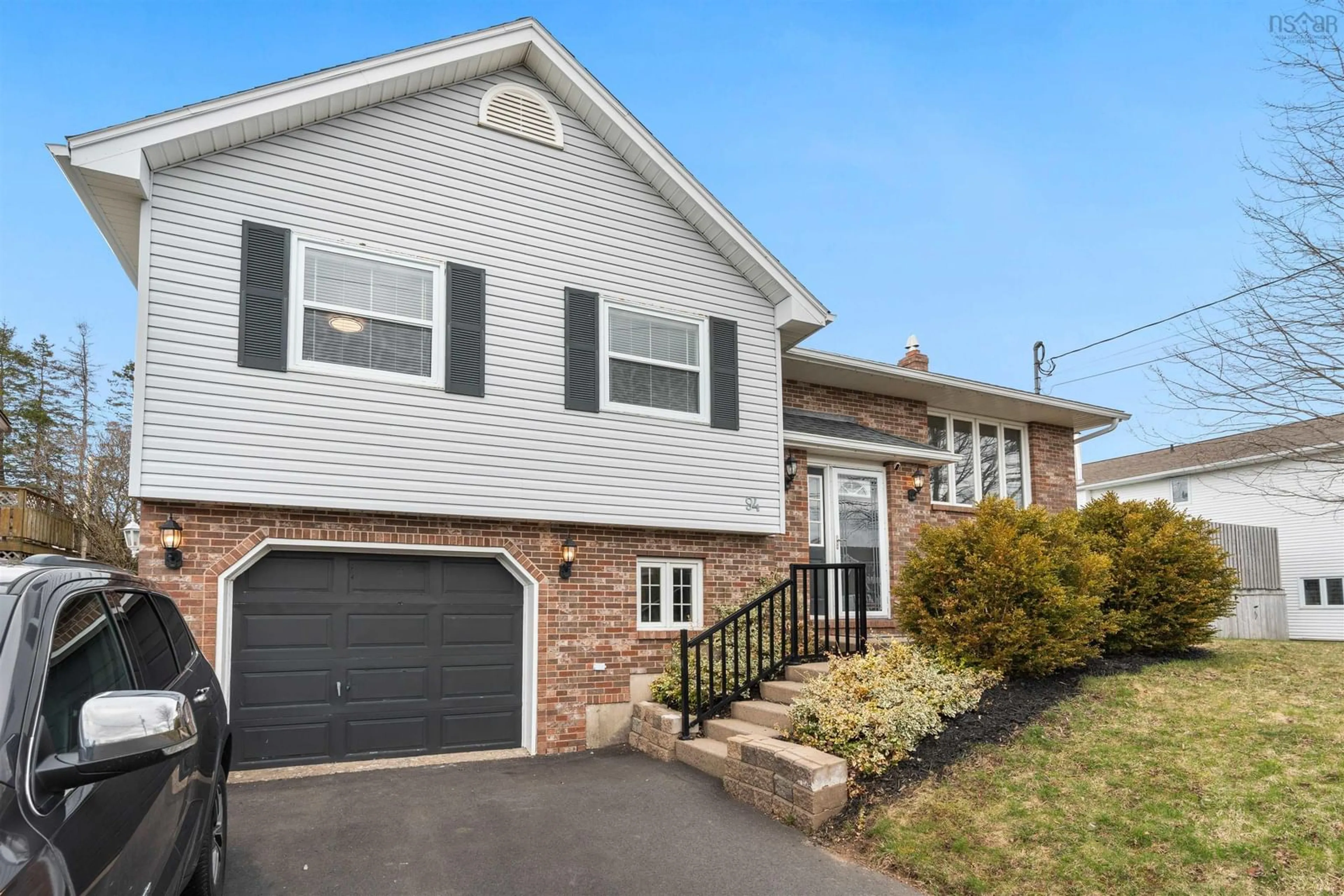 Home with vinyl exterior material, street for 94 Stratford Dr, Cole Harbour Nova Scotia B2V 2R2