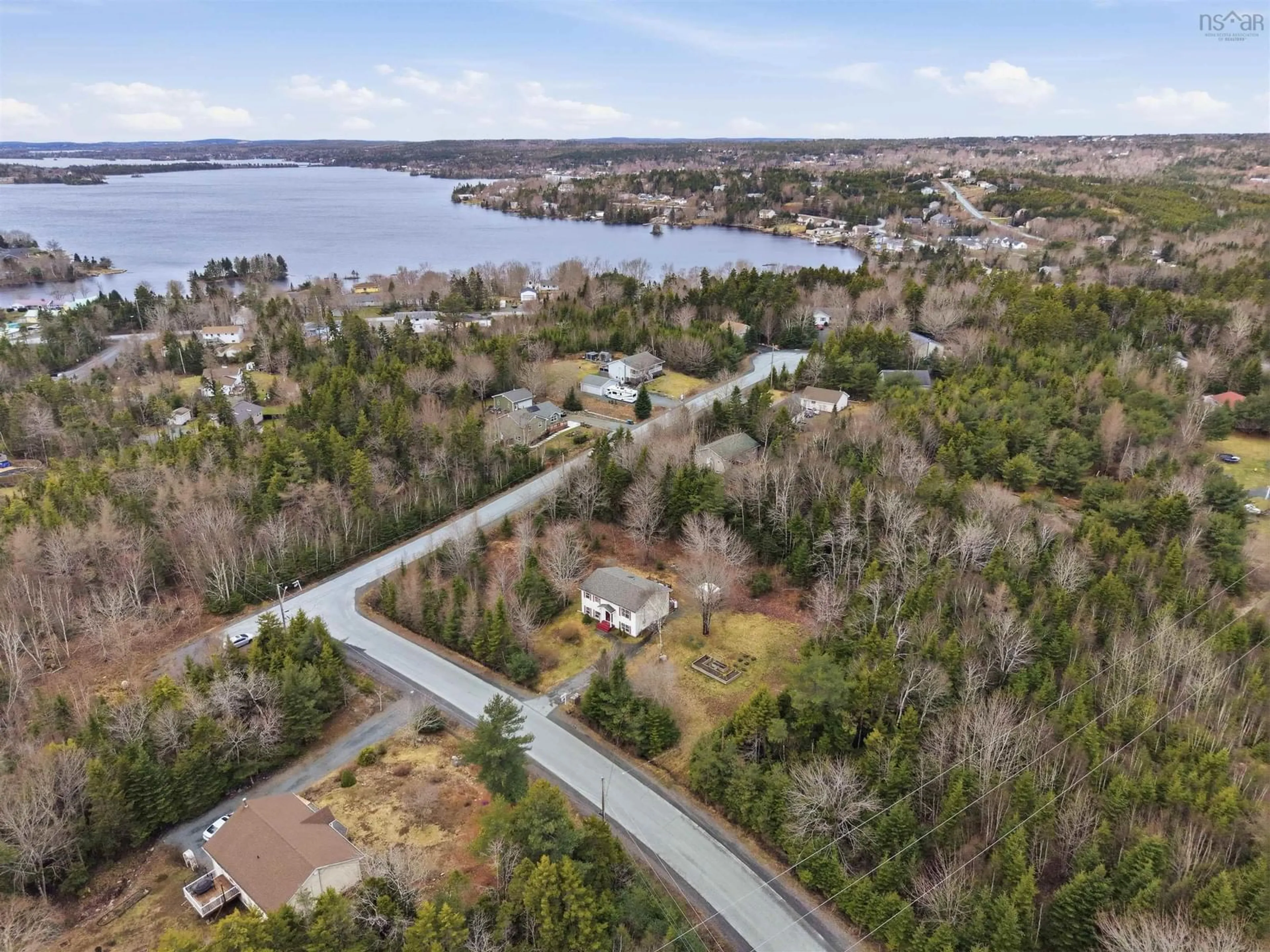 A pic from outside/outdoor area/front of a property/back of a property/a pic from drone, water/lake/river/ocean view for 15 Geneva Crt, Porters Lake Nova Scotia B3E 1J2