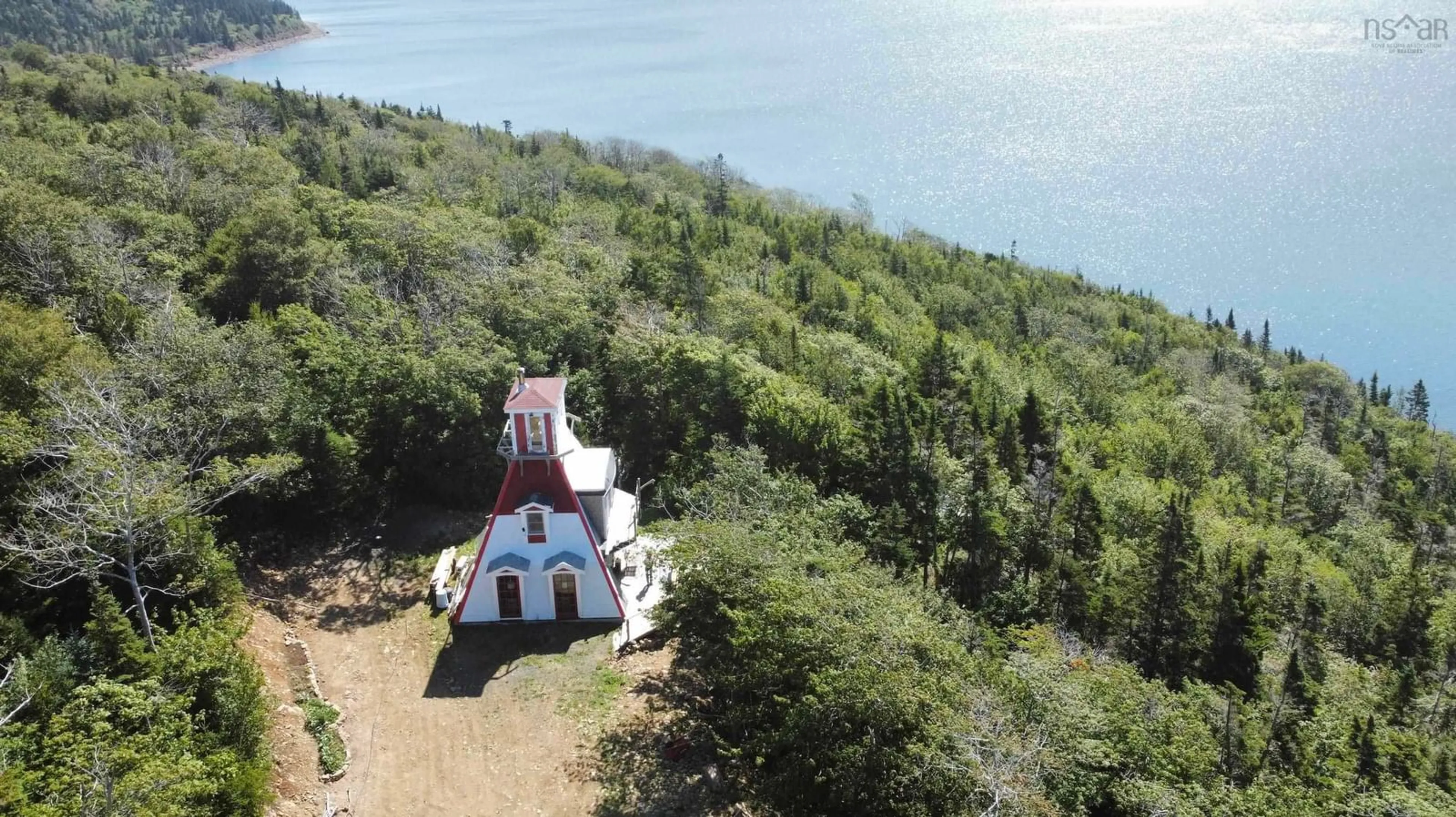 A pic from outside/outdoor area/front of a property/back of a property/a pic from drone, water/lake/river/ocean view for 111 St Mary's Lane, Waterford Nova Scotia B0V 1A0