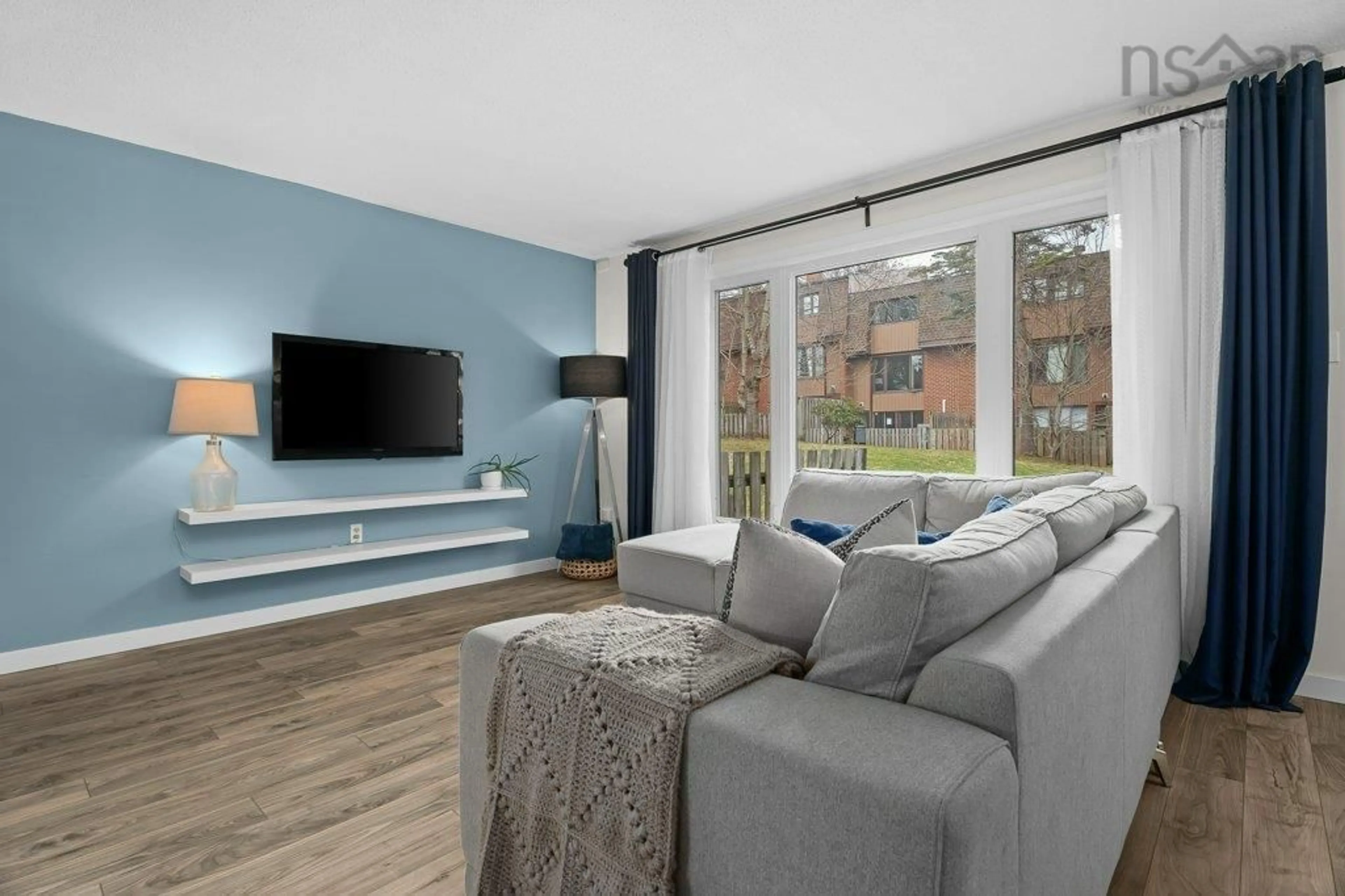Living room with furniture, wood/laminate floor for 16 Covington Way, Halifax Nova Scotia B3M 3K2