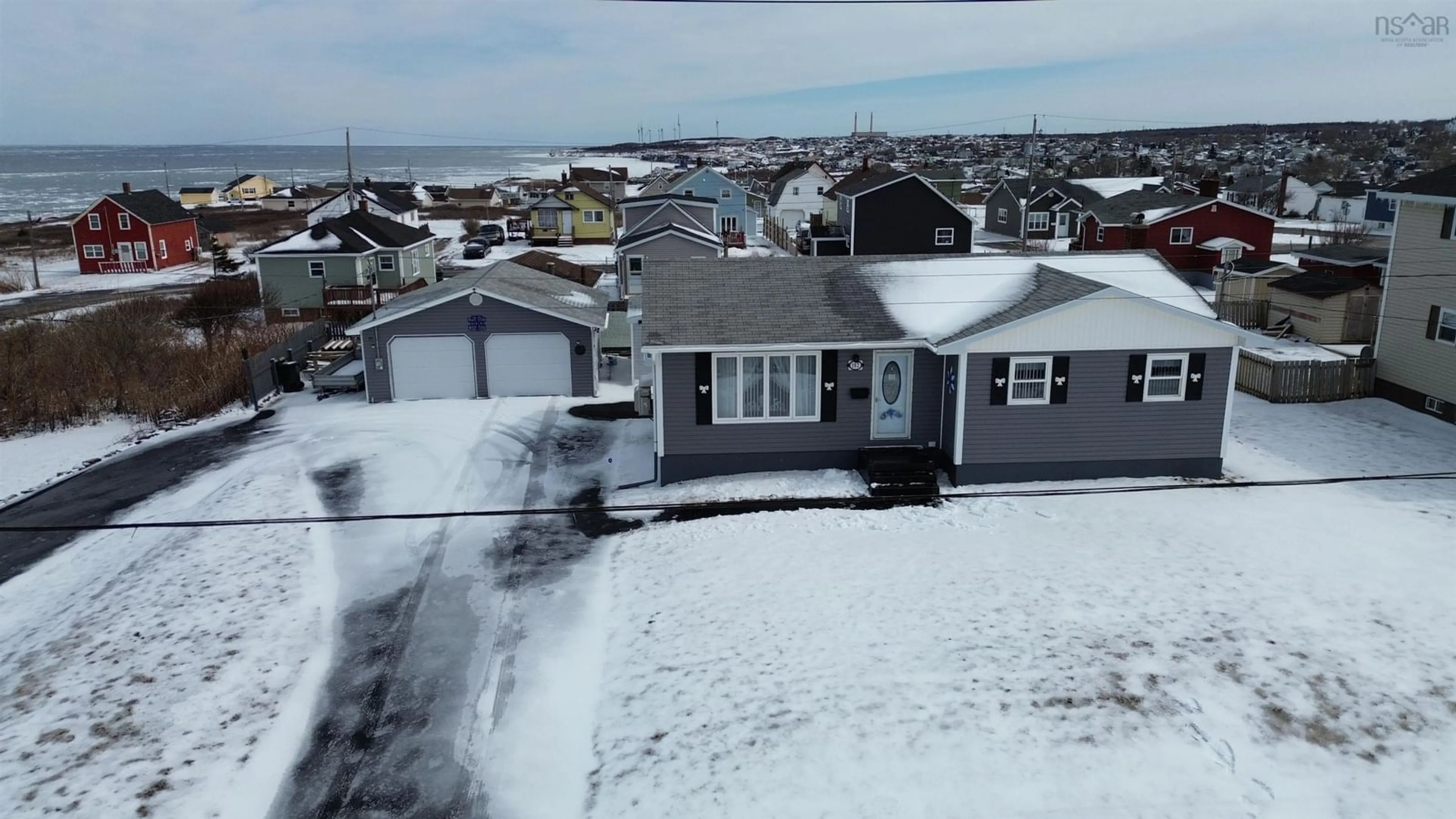 A pic from outside/outdoor area/front of a property/back of a property/a pic from drone, street for 182 & 174 James St, New Waterford Nova Scotia B1H 2X8