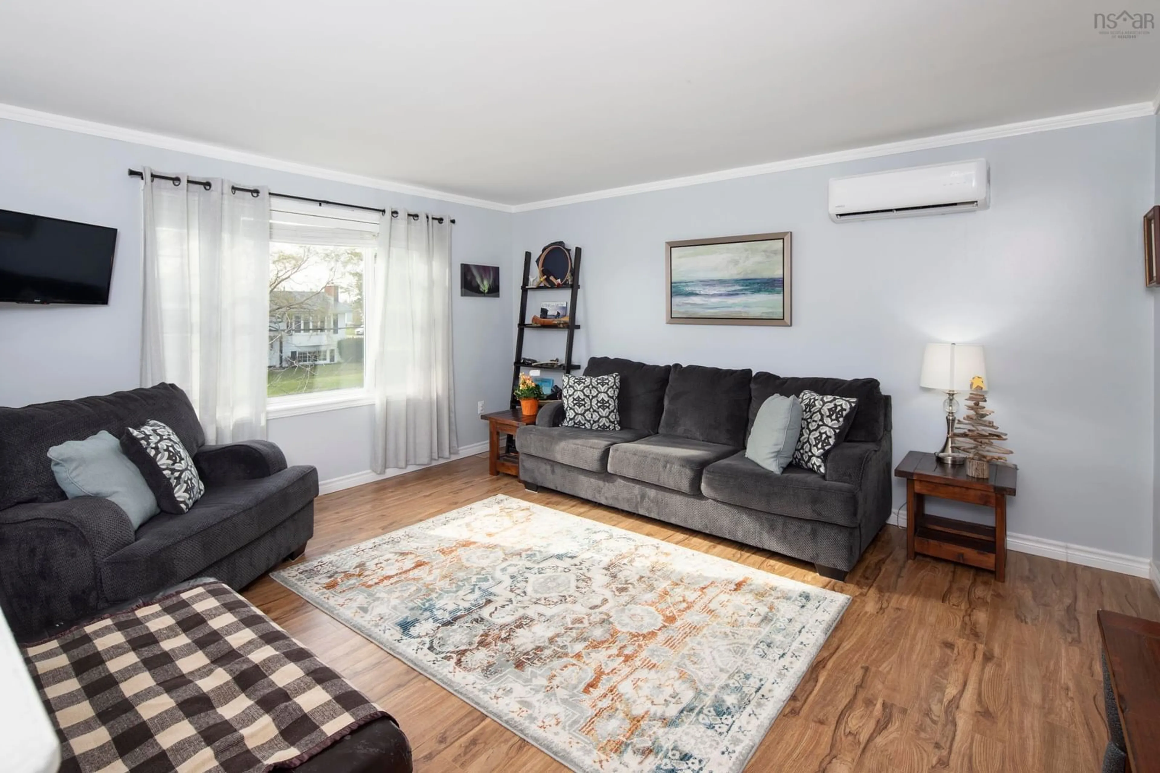 Living room with furniture, wood/laminate floor for 4 Evergreen Dr, Cole Harbour Nova Scotia B2W 4A7