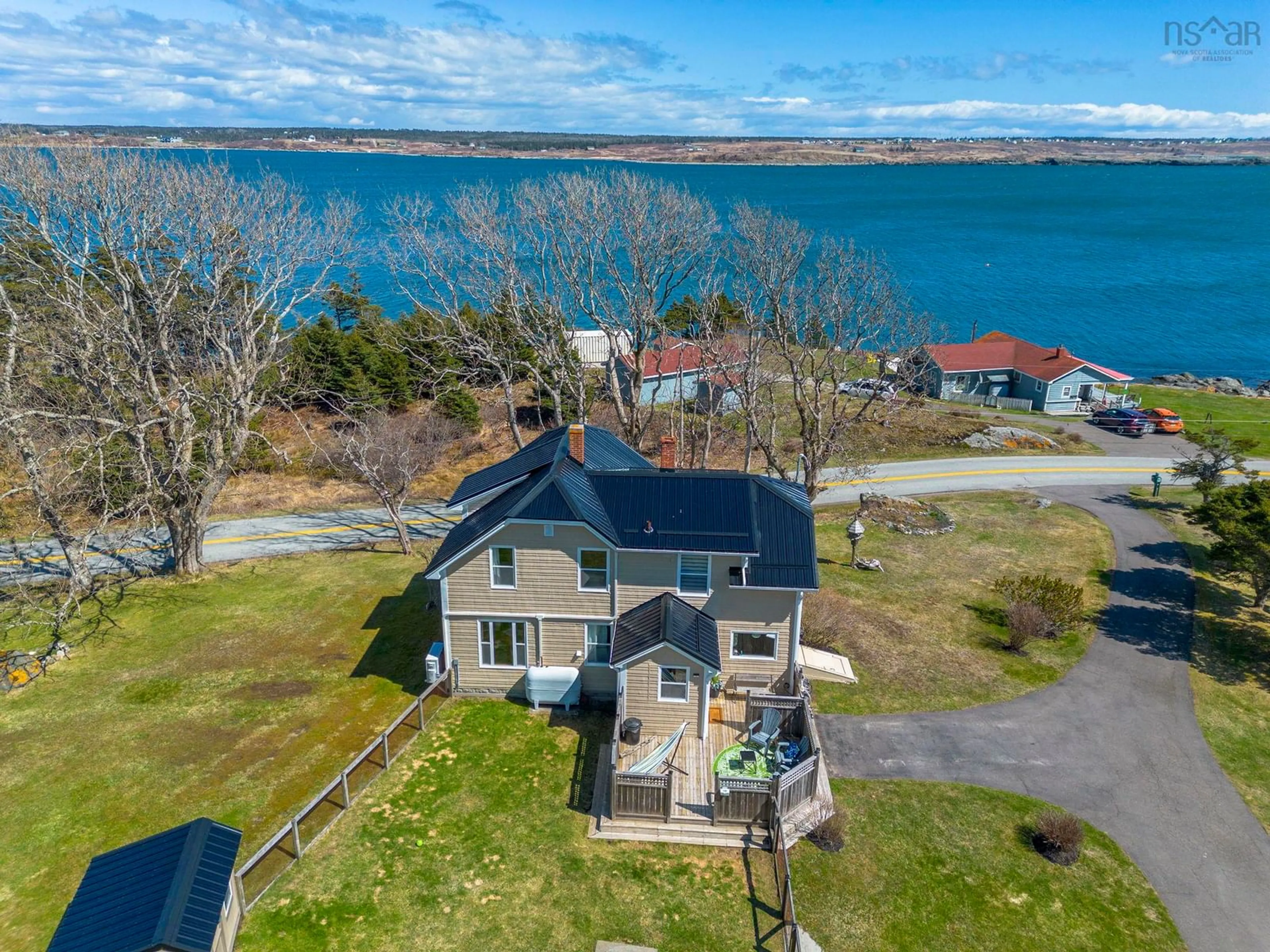 A pic from outside/outdoor area/front of a property/back of a property/a pic from drone, water/lake/river/ocean view for 1772 304 Hwy, Cape Forchu Nova Scotia B5A 5G7