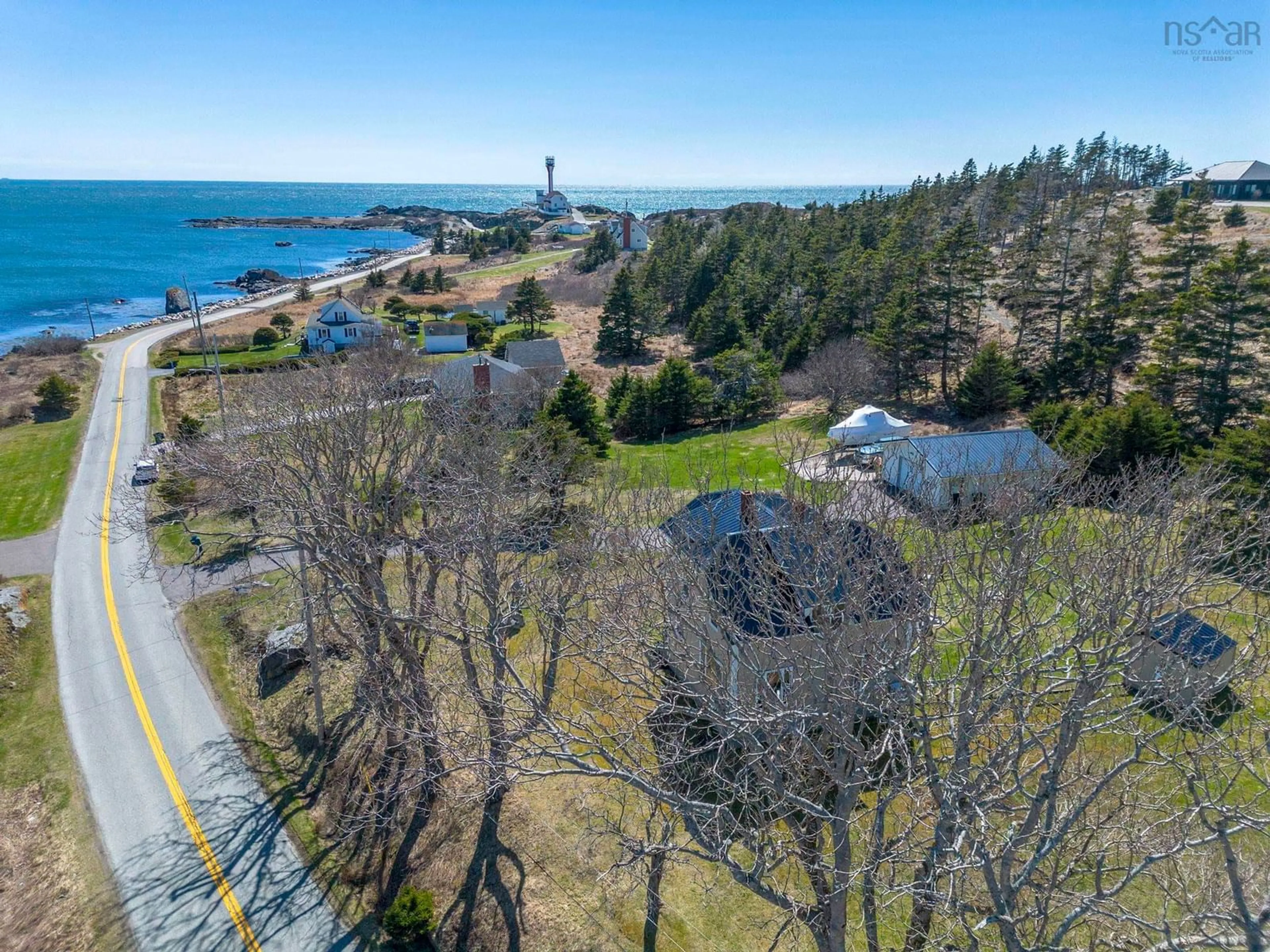 A pic from outside/outdoor area/front of a property/back of a property/a pic from drone, water/lake/river/ocean view for 1772 304 Hwy, Cape Forchu Nova Scotia B5A 5G7