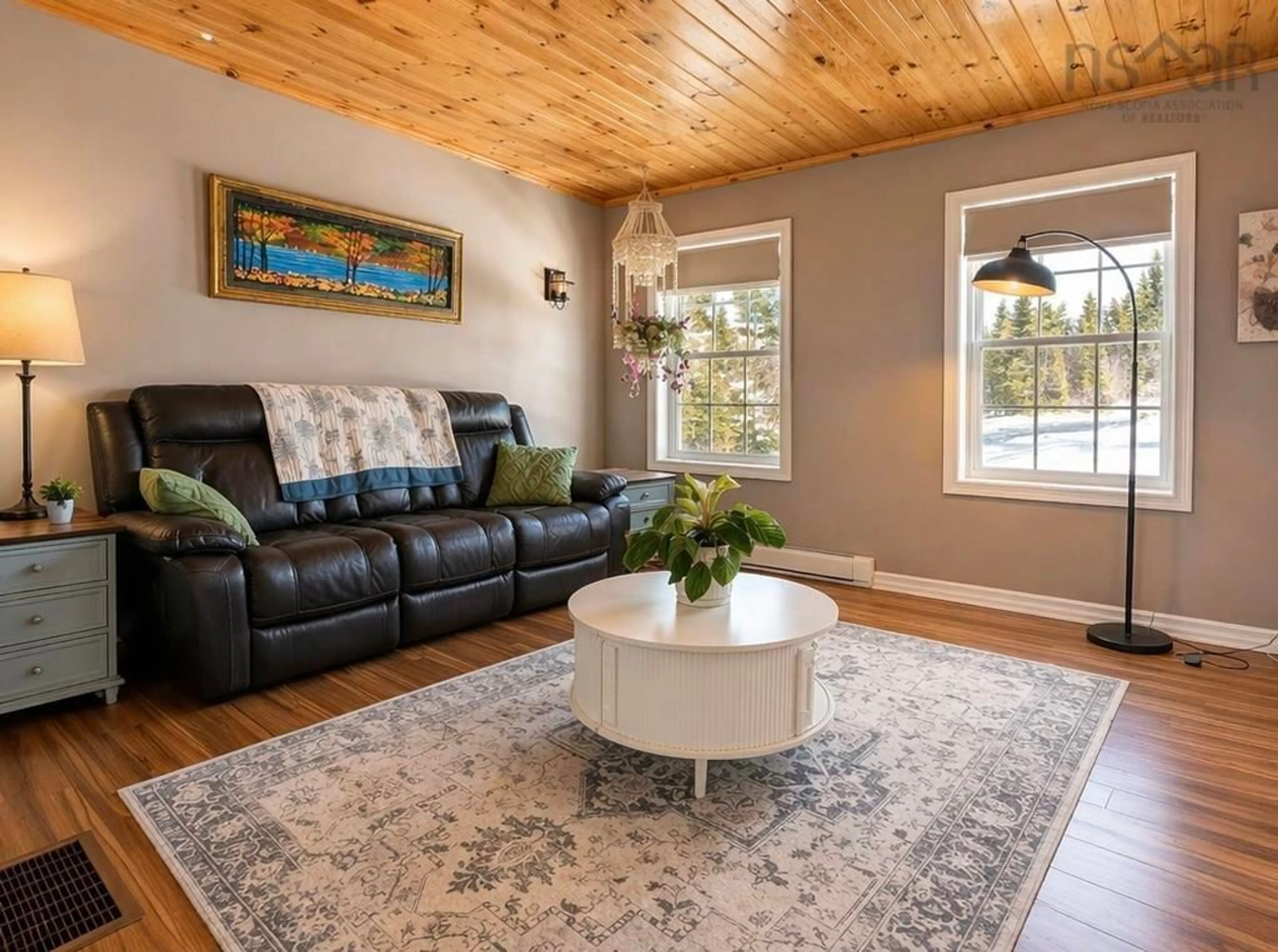 Living room with furniture, wood/laminate floor for 5 Osoogoone Lane, Clam Bay Nova Scotia B0J 2L0