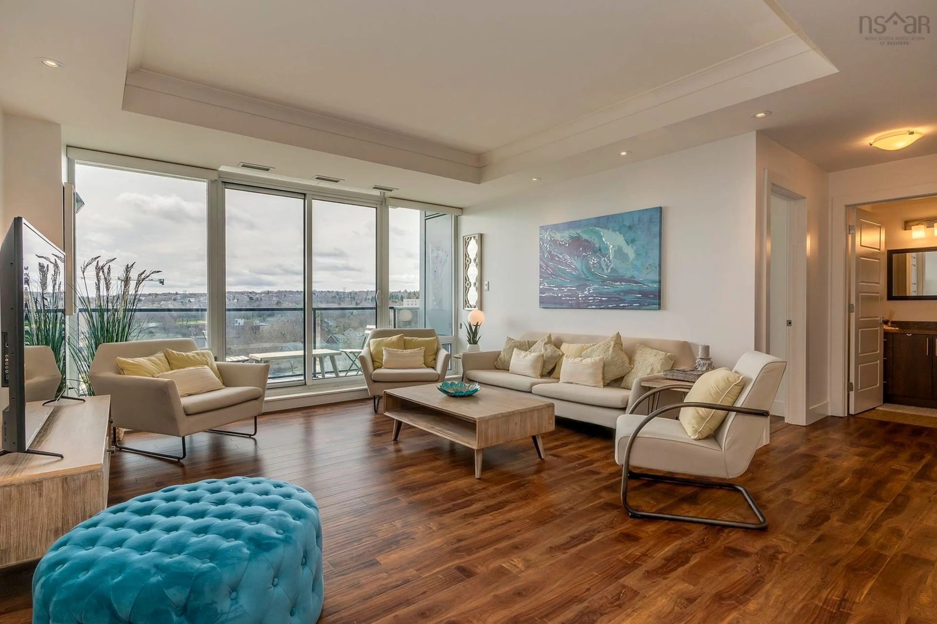 Living room with furniture, wood/laminate floor for 3471 Dutch Village Rd #1004, Halifax Nova Scotia B3N 0C7