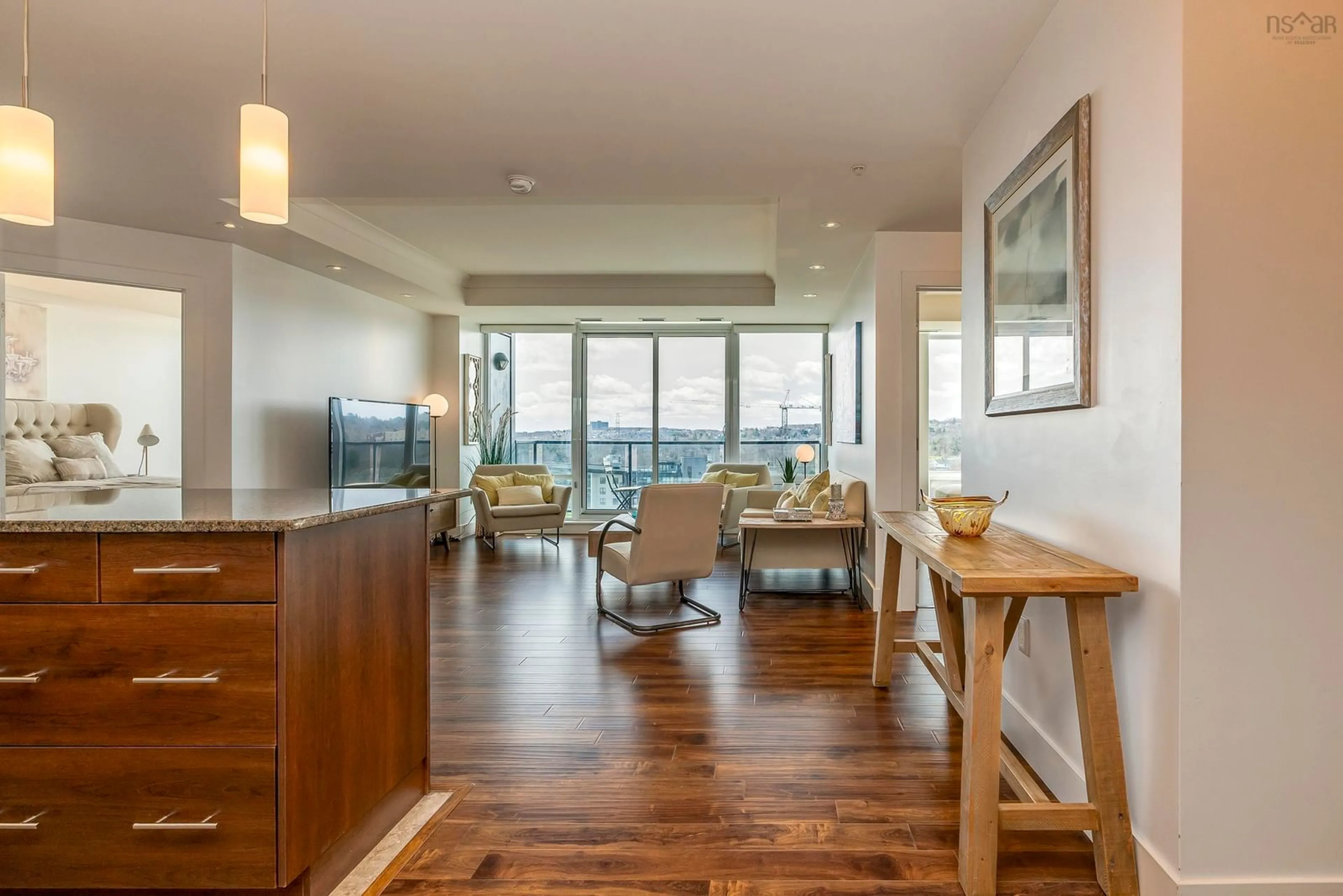 Living room with furniture, wood/laminate floor for 3471 Dutch Village Rd #1004, Halifax Nova Scotia B3N 0C7