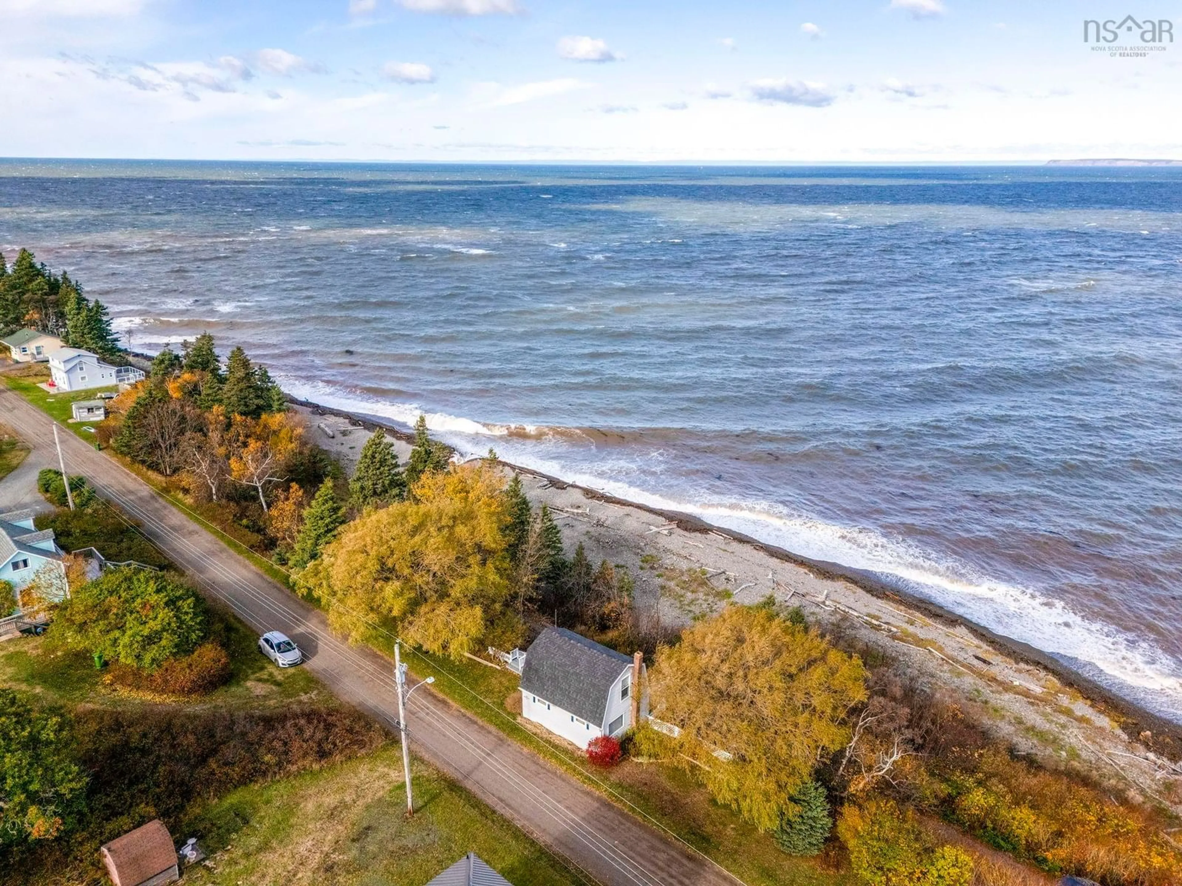 A pic from outside/outdoor area/front of a property/back of a property/a pic from drone, water/lake/river/ocean view for 33 Lower Street, Morden Nova Scotia B0P 1C0
