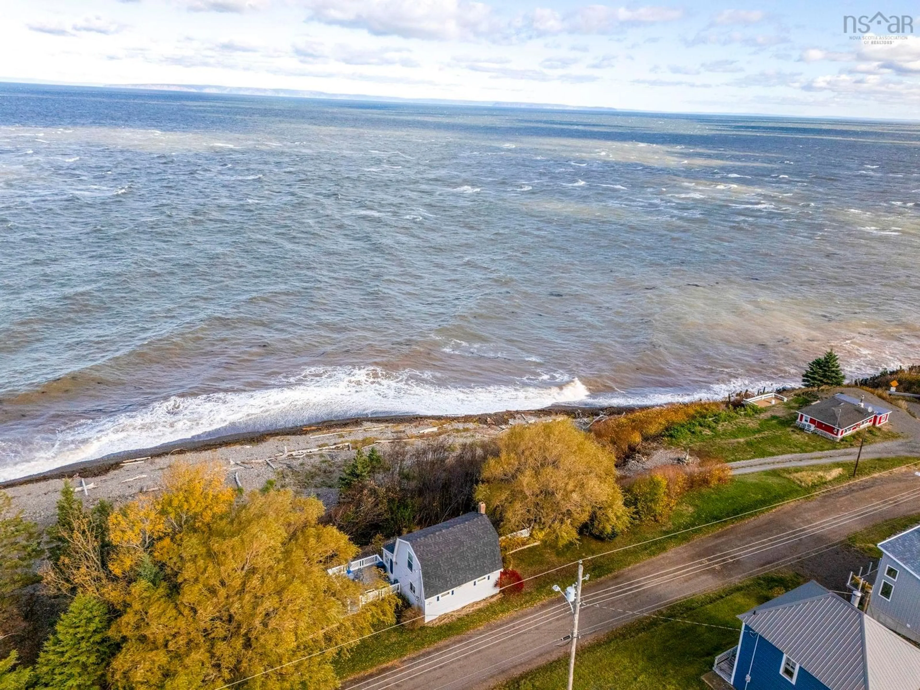 A pic from outside/outdoor area/front of a property/back of a property/a pic from drone, water/lake/river/ocean view for 33 Lower Street, Morden Nova Scotia B0P 1C0