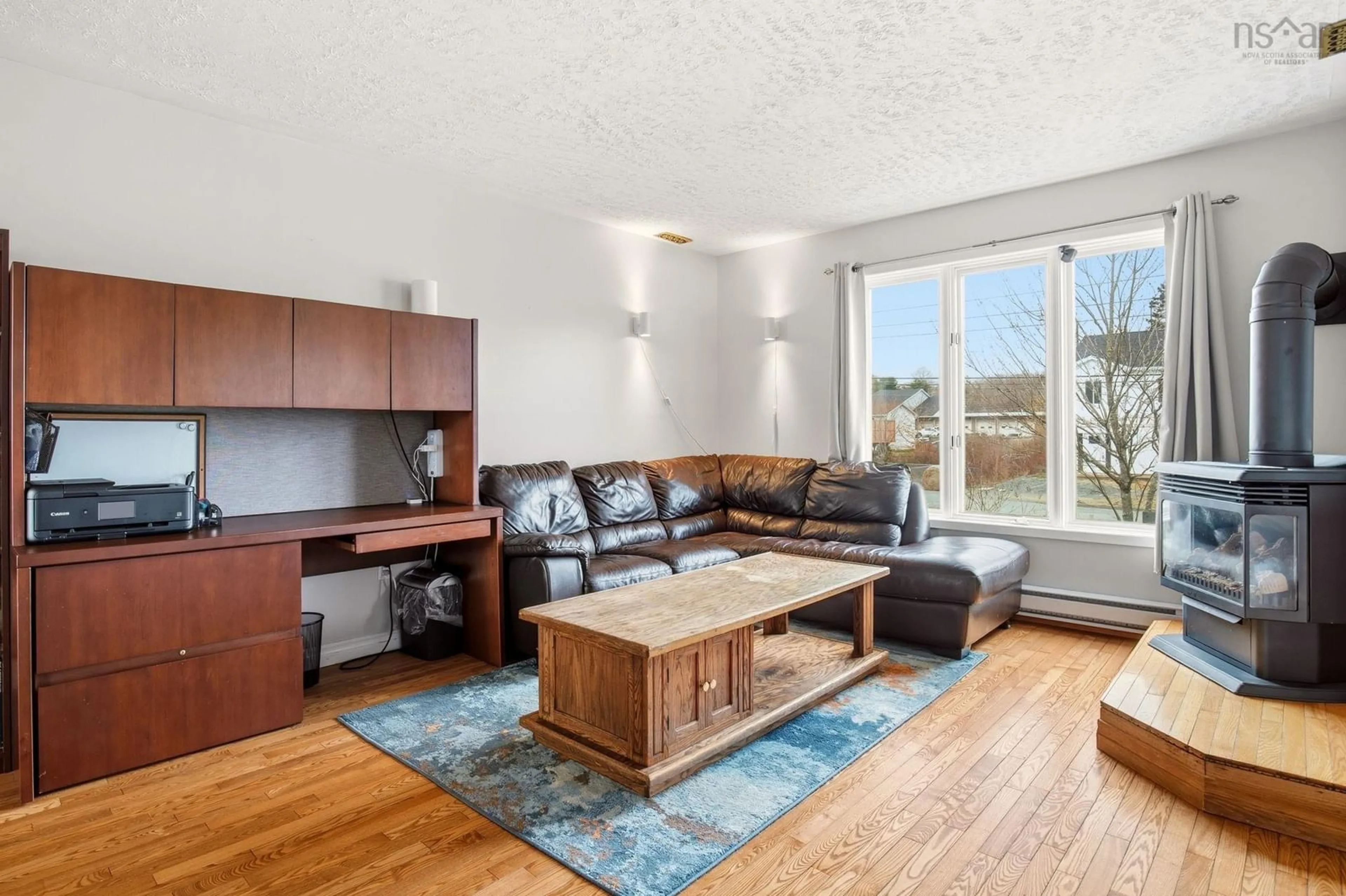 Living room with furniture, wood/laminate floor for 29 Seawood Ave, Lower Sackville Nova Scotia B4C 2L1