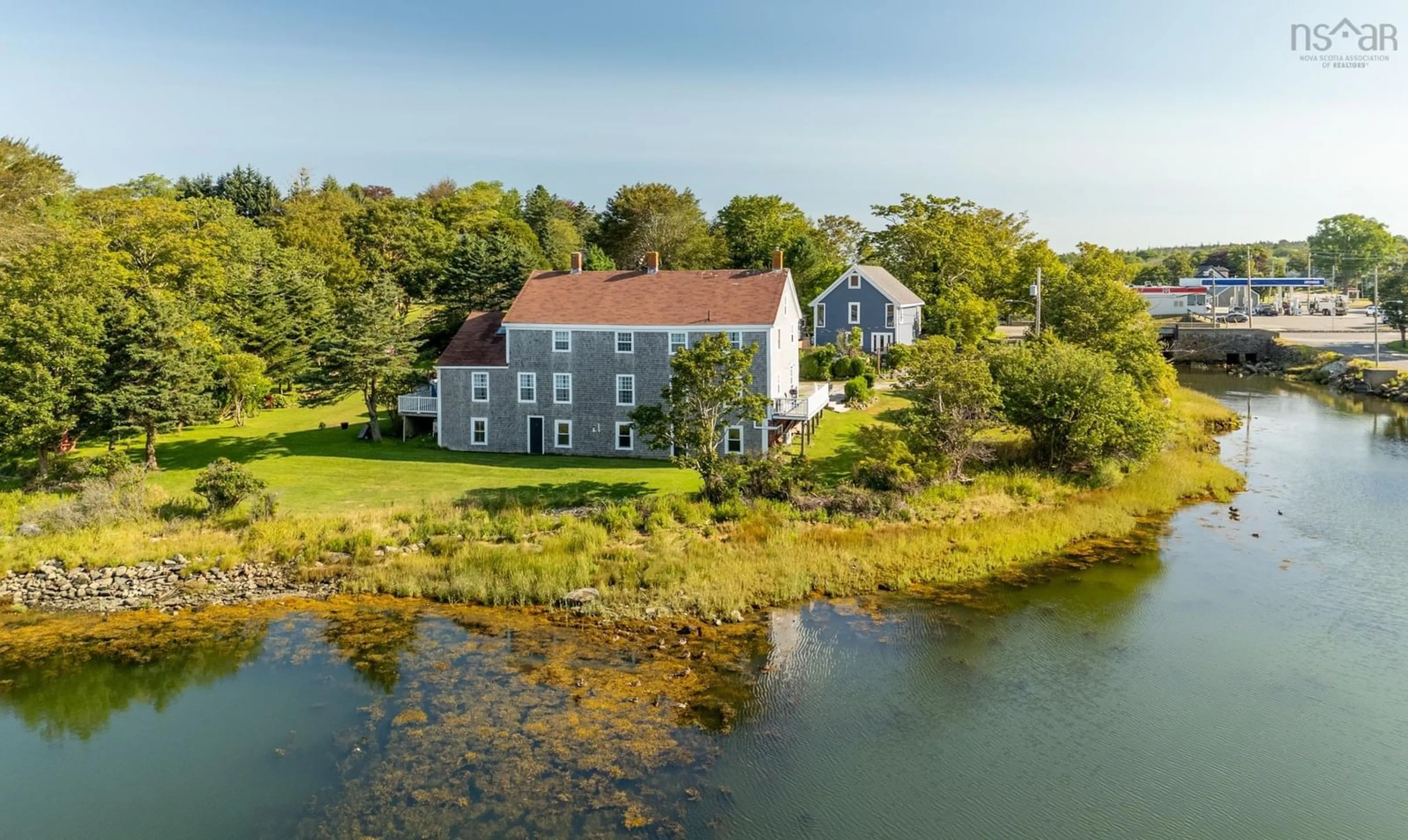A pic from outside/outdoor area/front of a property/back of a property/a pic from drone, water/lake/river/ocean view for 4 Market St, Yarmouth Nova Scotia B5A 4R5
