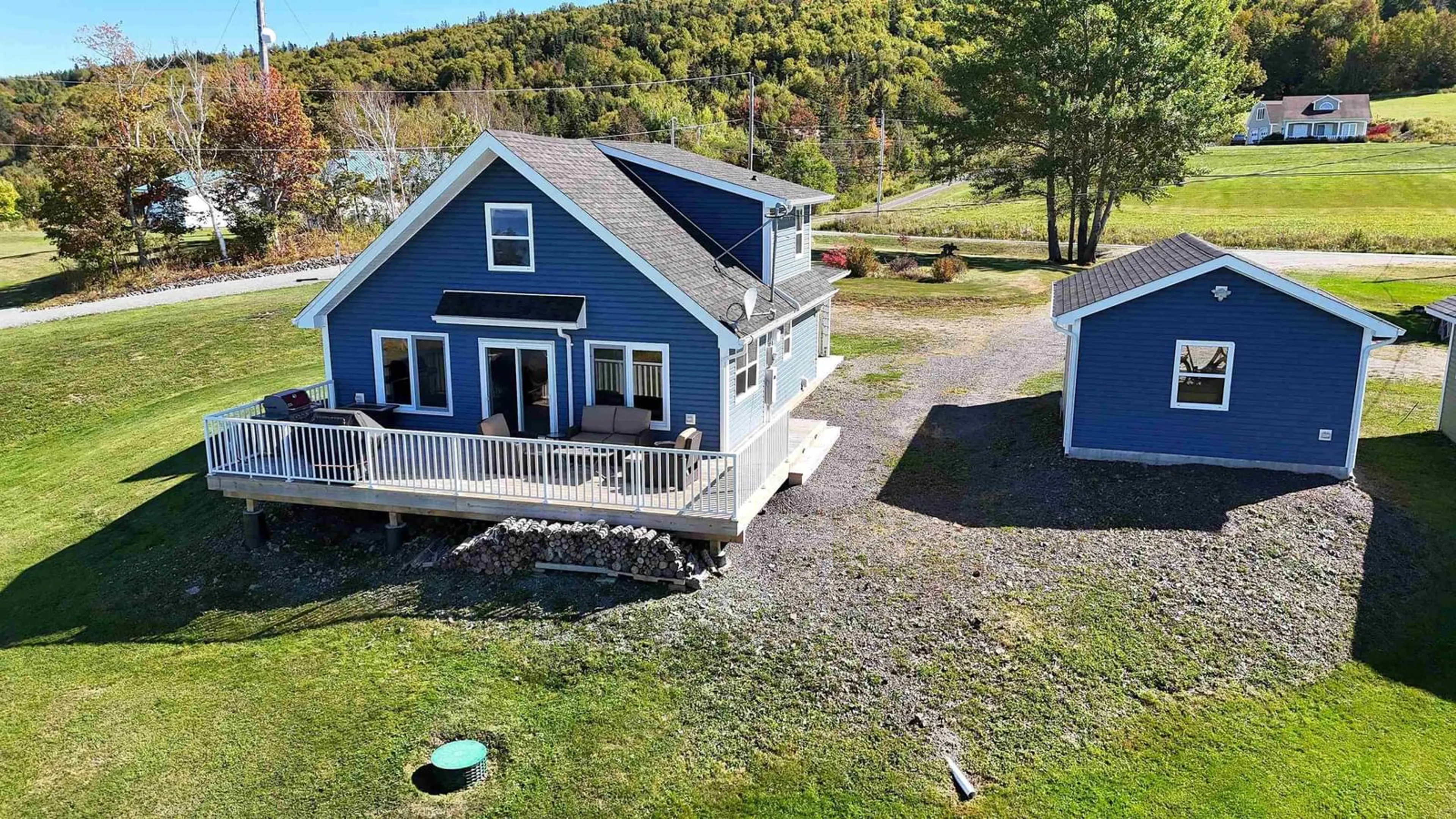 A pic from outside/outdoor area/front of a property/back of a property/a pic from drone, water/lake/river/ocean view for 3359 West Bay Rd, St. Georges Channel Nova Scotia B0E 3K0