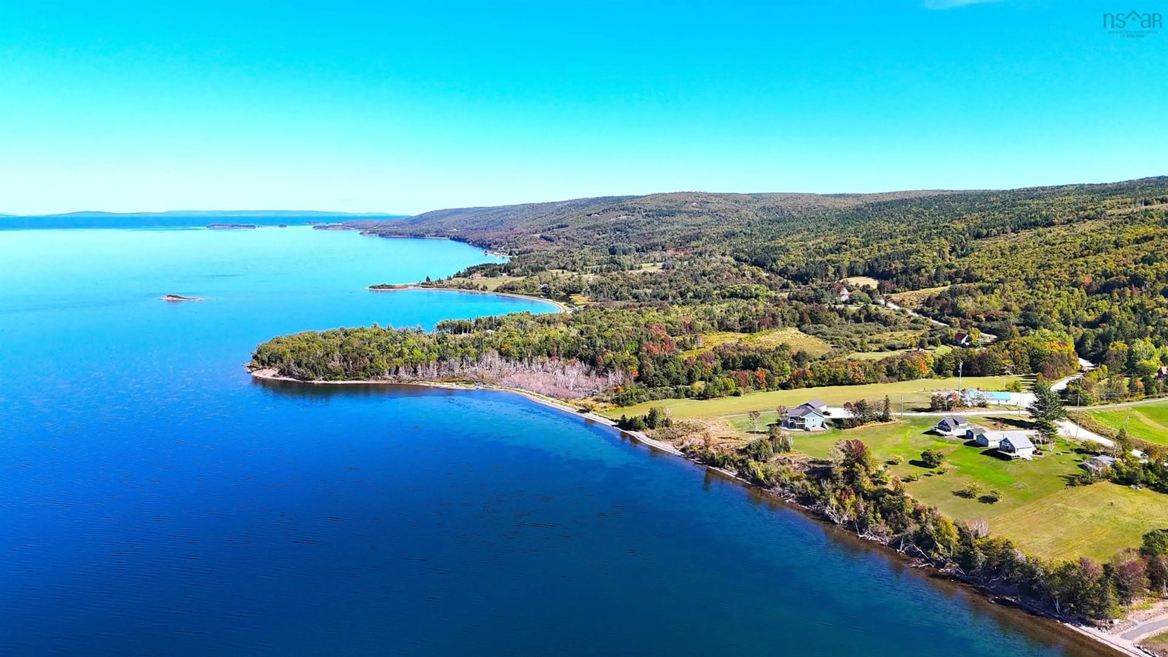A pic from outside/outdoor area/front of a property/back of a property/a pic from drone, water/lake/river/ocean view for 3359 West Bay Rd, St. Georges Channel Nova Scotia B0E 3K0