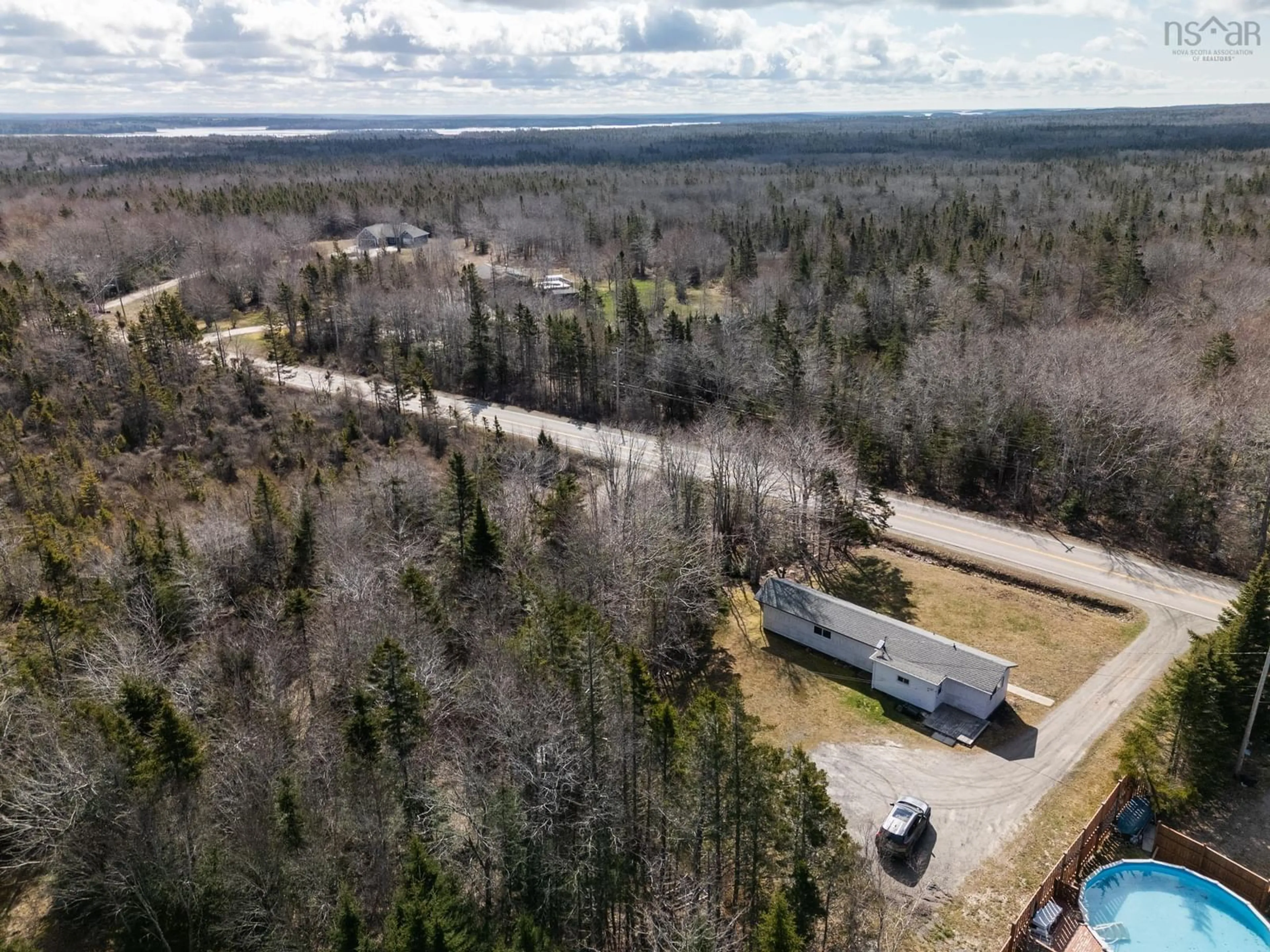 A pic from outside/outdoor area/front of a property/back of a property/a pic from drone, forest/trees view for 337 Highway 334, Arcadia Nova Scotia B0W 1B0
