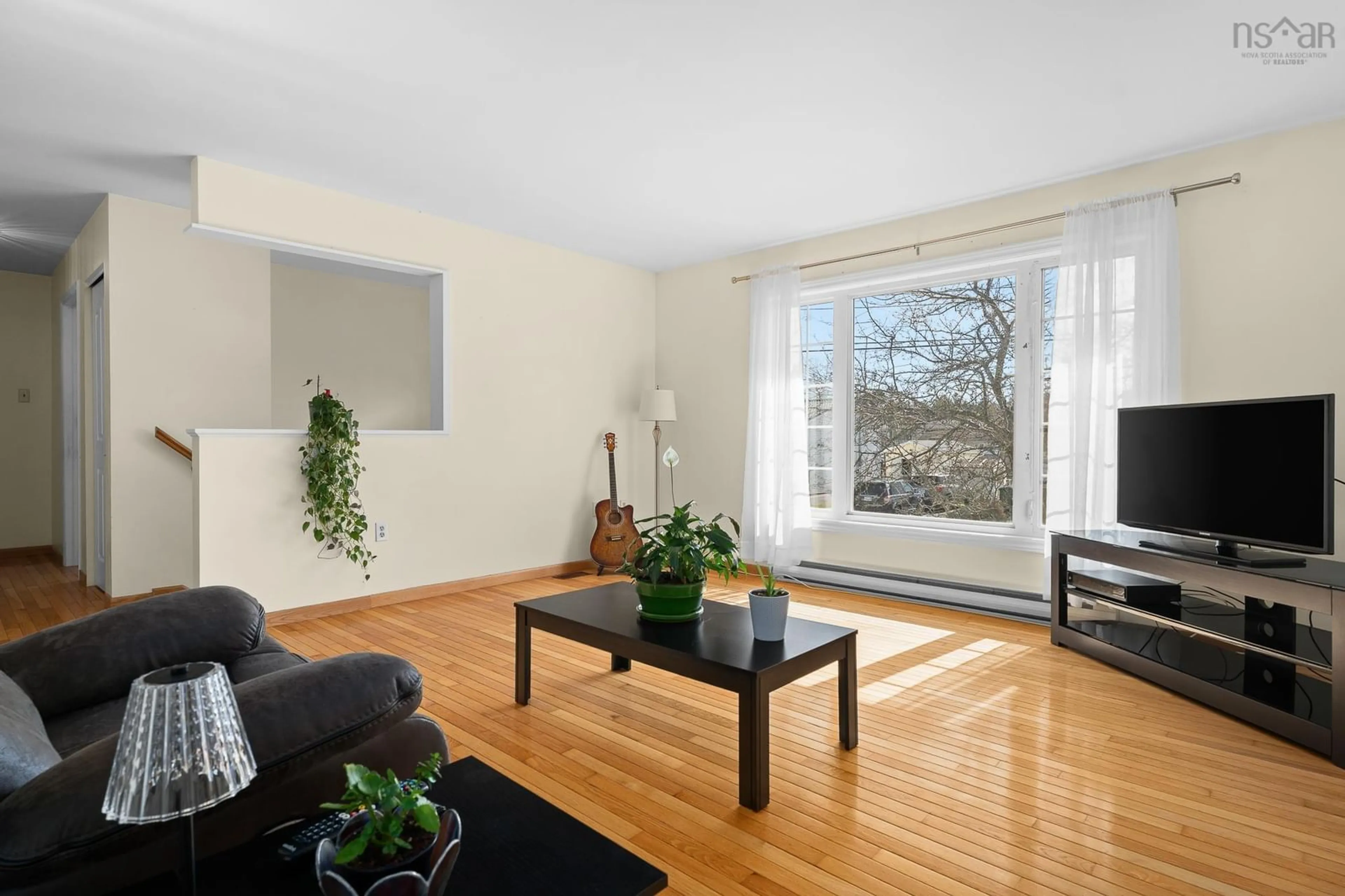 Living room with furniture, wood/laminate floor for 210 Churchill Downs Cir, Lower Sackville Nova Scotia B4E 2J7