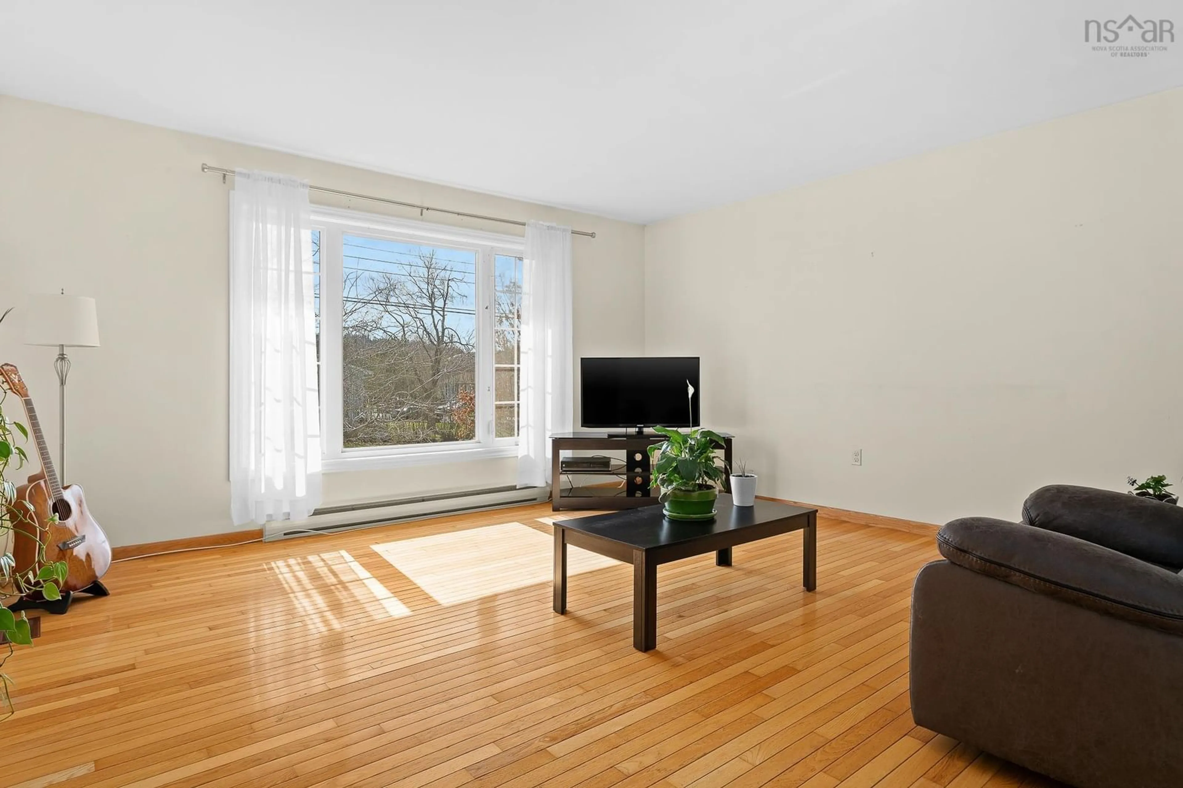 Living room with furniture, wood/laminate floor for 210 Churchill Downs Cir, Lower Sackville Nova Scotia B4E 2J7