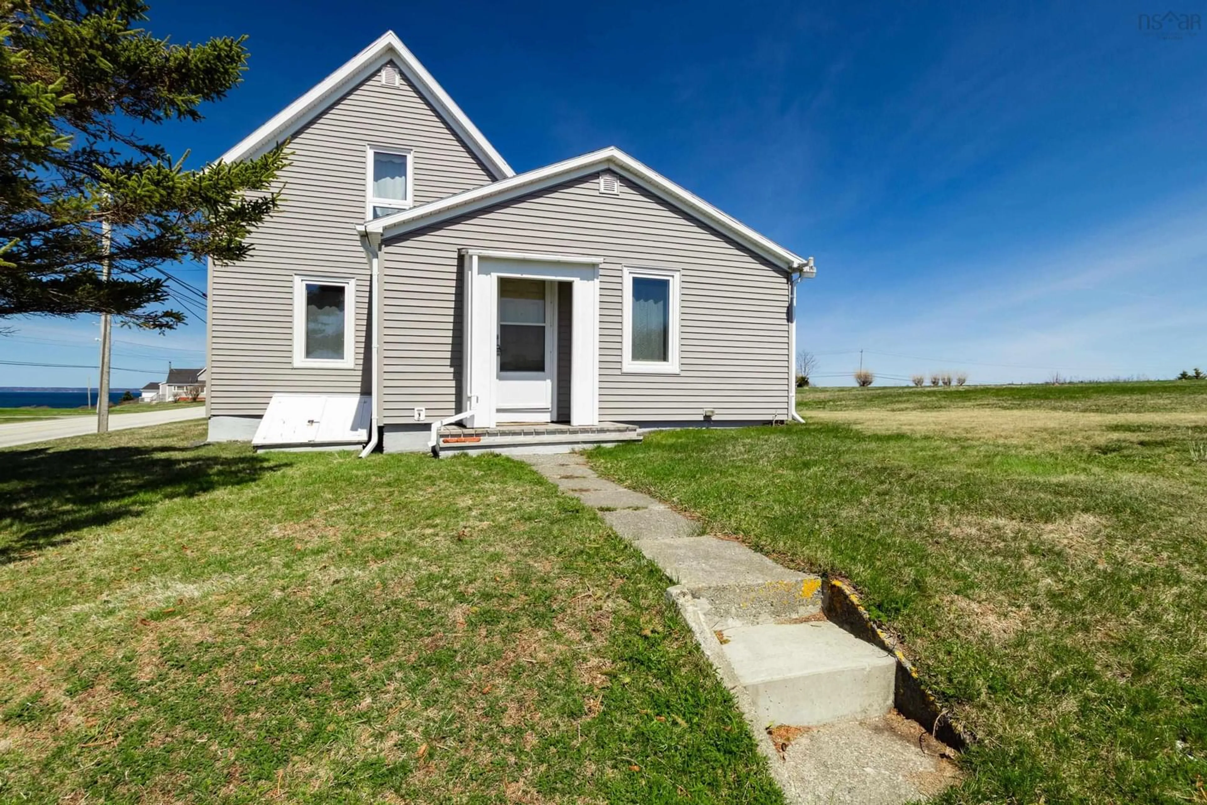 A pic from outside/outdoor area/front of a property/back of a property/a pic from drone, street for 10130 Highway 1, Saulnierville Nova Scotia B0W 2Z0