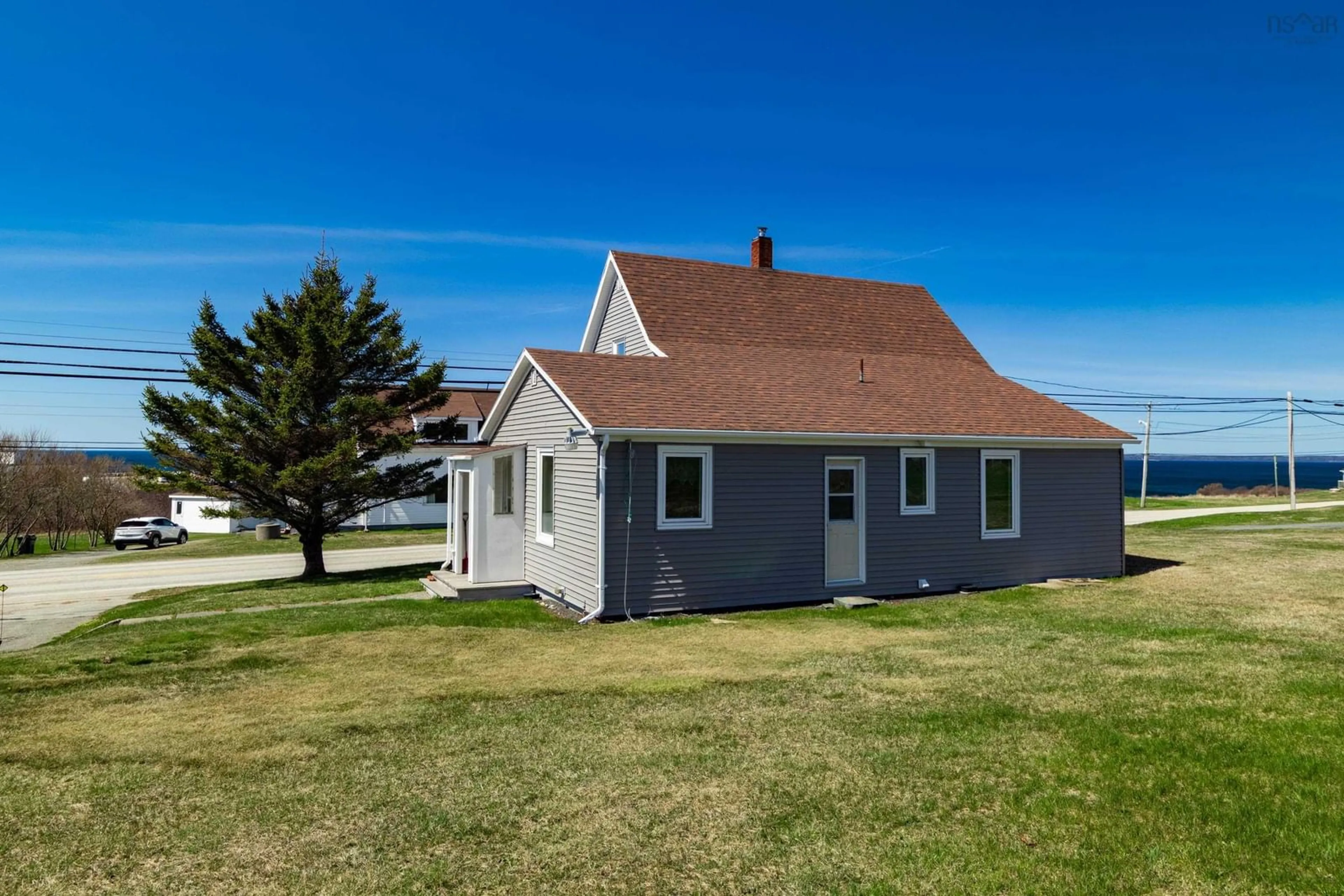 A pic from outside/outdoor area/front of a property/back of a property/a pic from drone, unknown for 10130 Highway 1, Saulnierville Nova Scotia B0W 2Z0