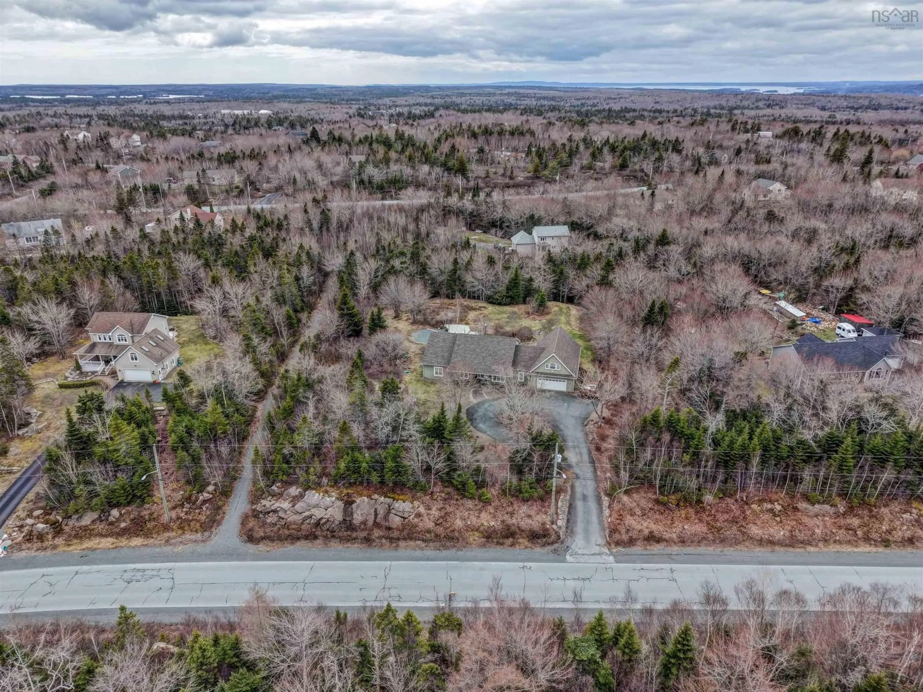 A pic from outside/outdoor area/front of a property/back of a property/a pic from drone, forest/trees view for 103 Sussex Dr, Stillwater Lake Nova Scotia B3Z 4J2