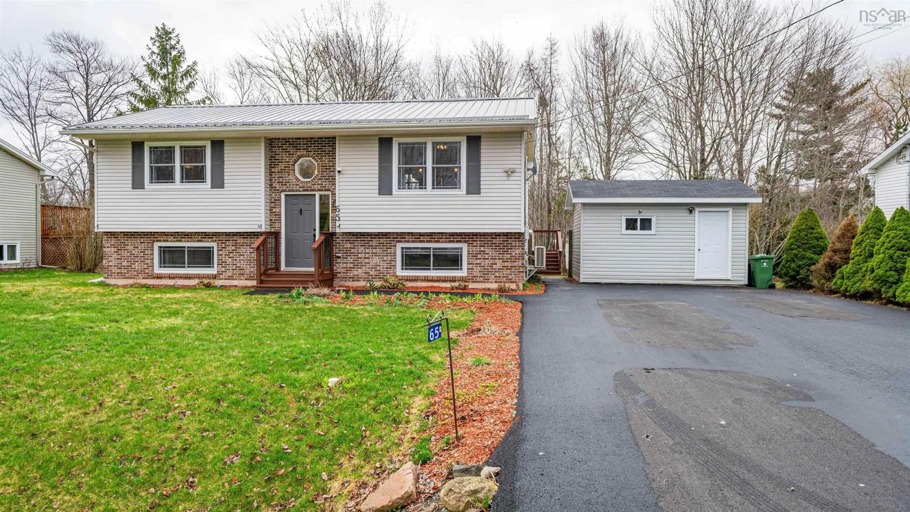 Home with vinyl exterior material, street for 65 Tannery Dr, Elmsdale Nova Scotia B2S 1C6