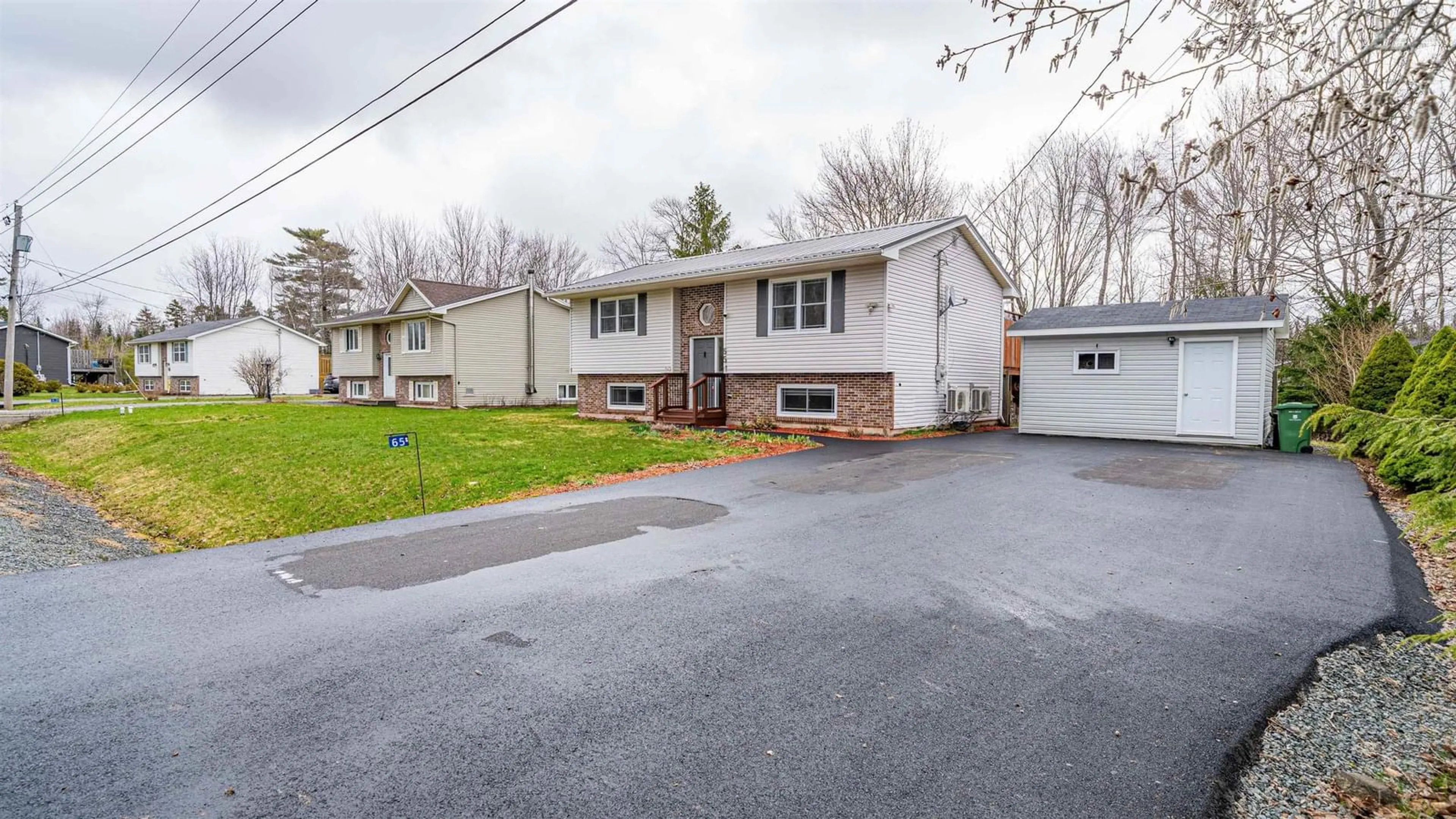Home with vinyl exterior material, street for 65 Tannery Dr, Elmsdale Nova Scotia B2S 1C6