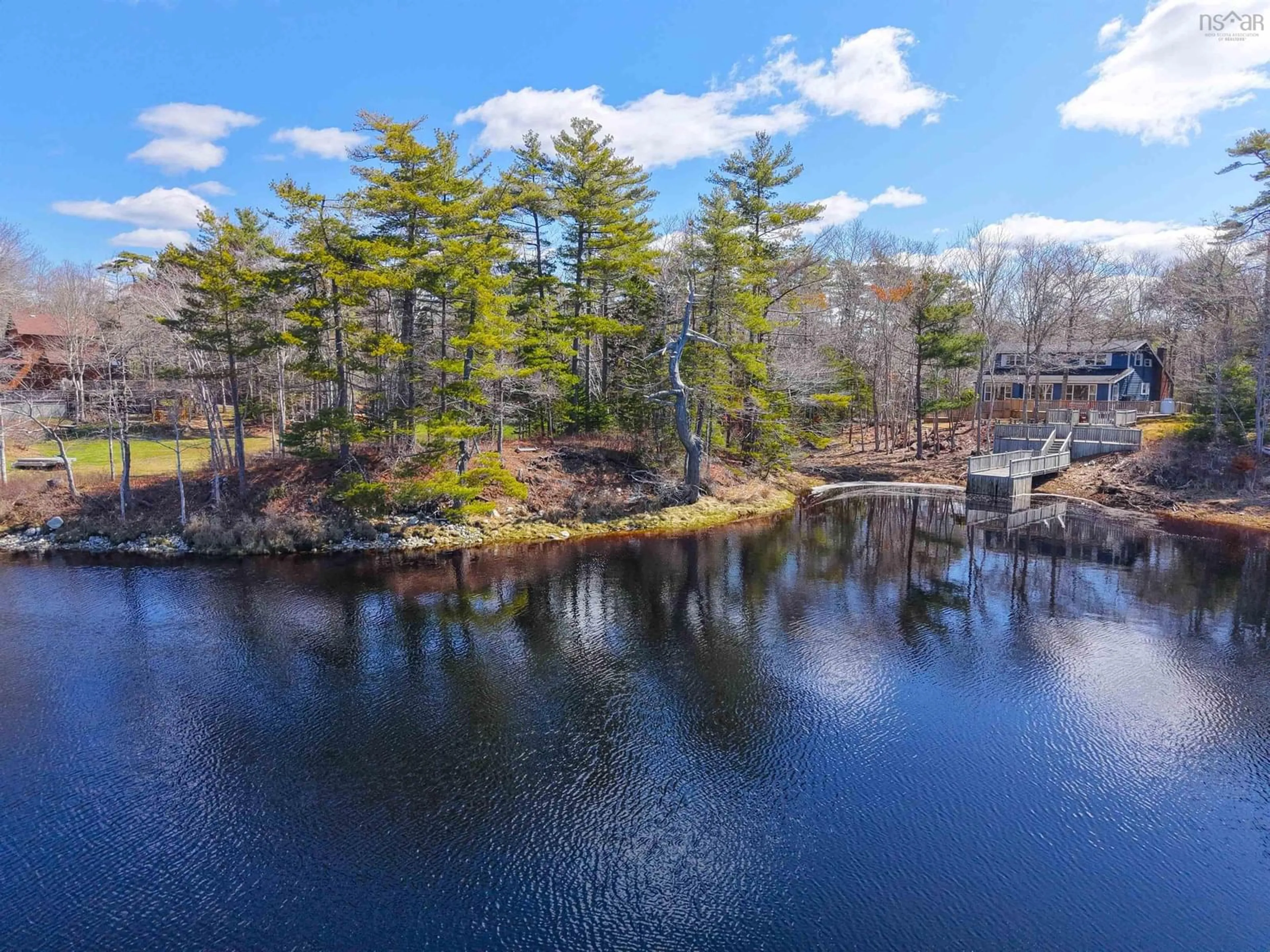 A pic from outside/outdoor area/front of a property/back of a property/a pic from drone, water/lake/river/ocean view for 74 Mcgills Point Lane, Shelburne Nova Scotia B0T 1W0