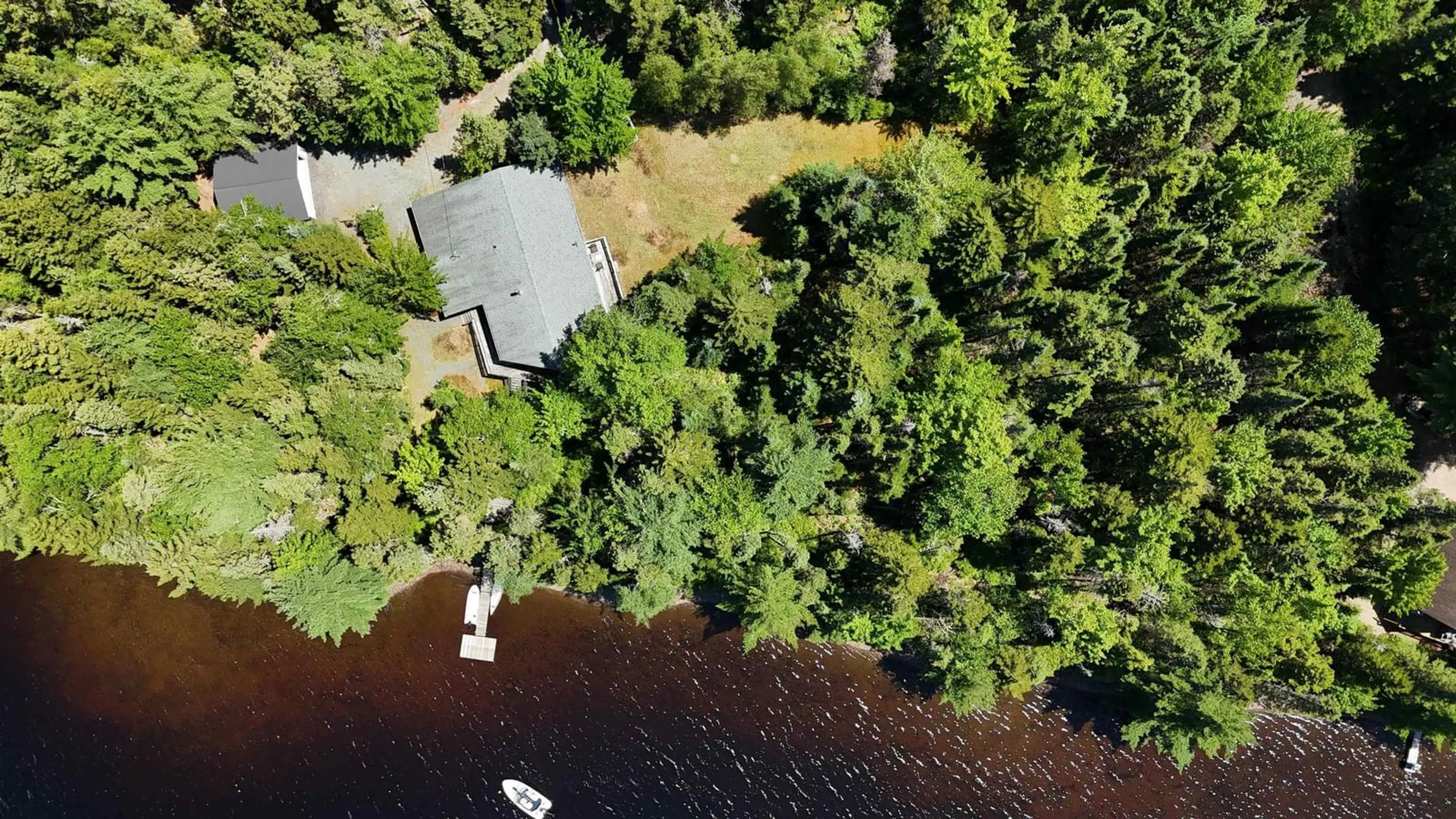 A pic from outside/outdoor area/front of a property/back of a property/a pic from drone, water/lake/river/ocean view for 376 Lakefront Dr, Chelsea Nova Scotia B4V 7M9