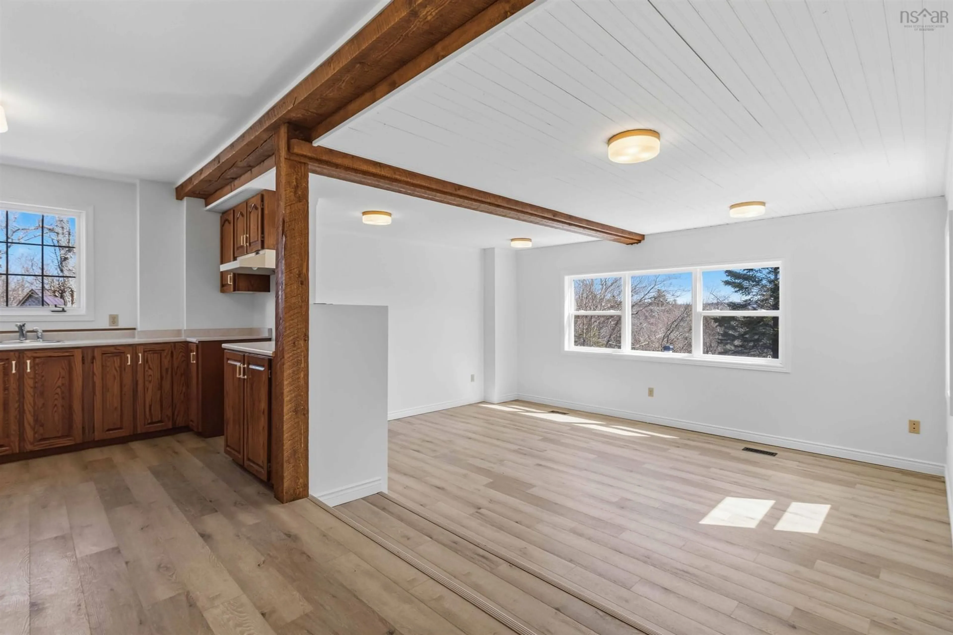 Open concept kitchen, wood/laminate floor for 341 Myra Rd, Porters Lake Nova Scotia B3E 1G2