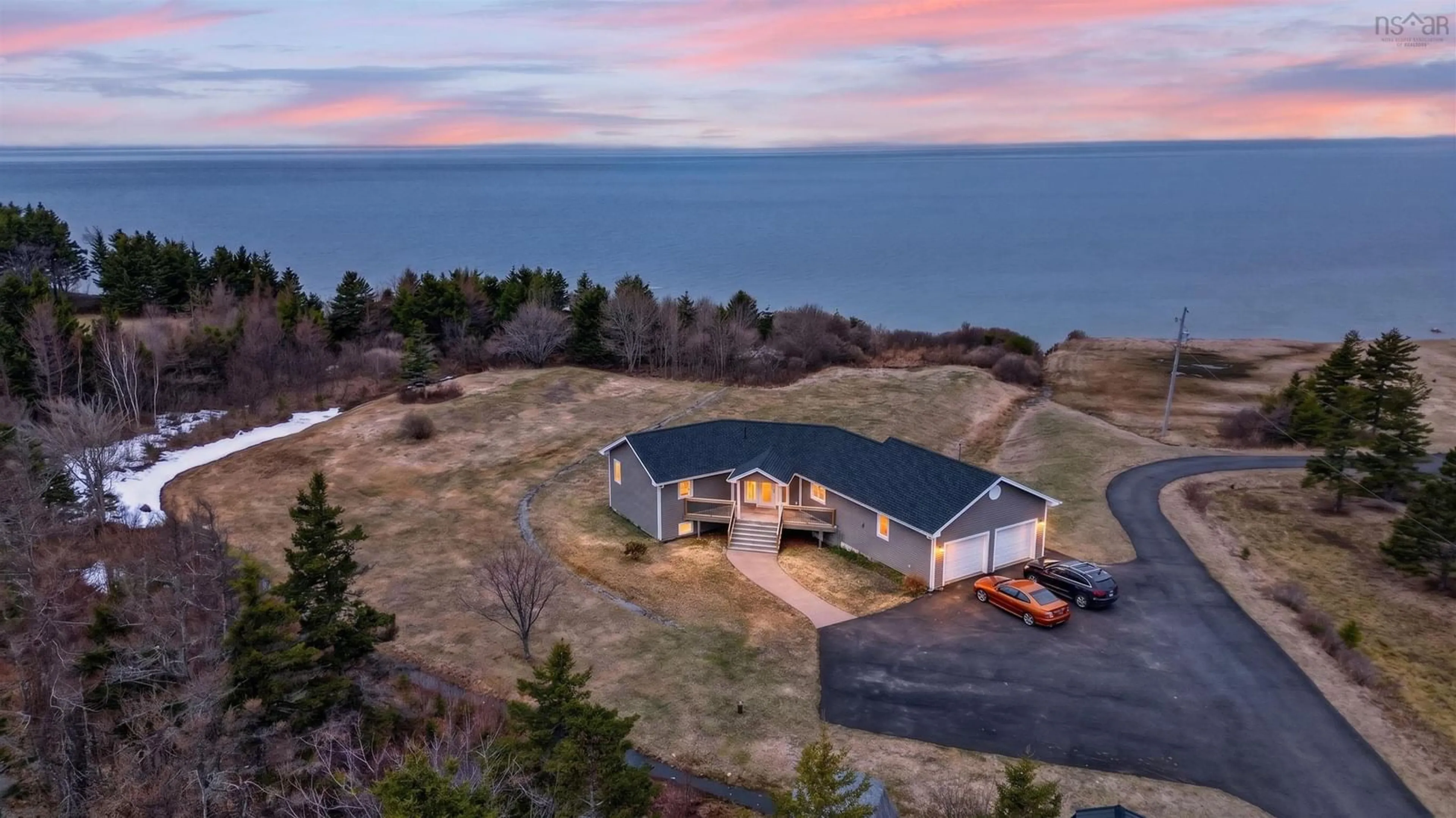 A pic from outside/outdoor area/front of a property/back of a property/a pic from drone, water/lake/river/ocean view for 3599 Highway 19, Long Point Nova Scotia B0E 1P0