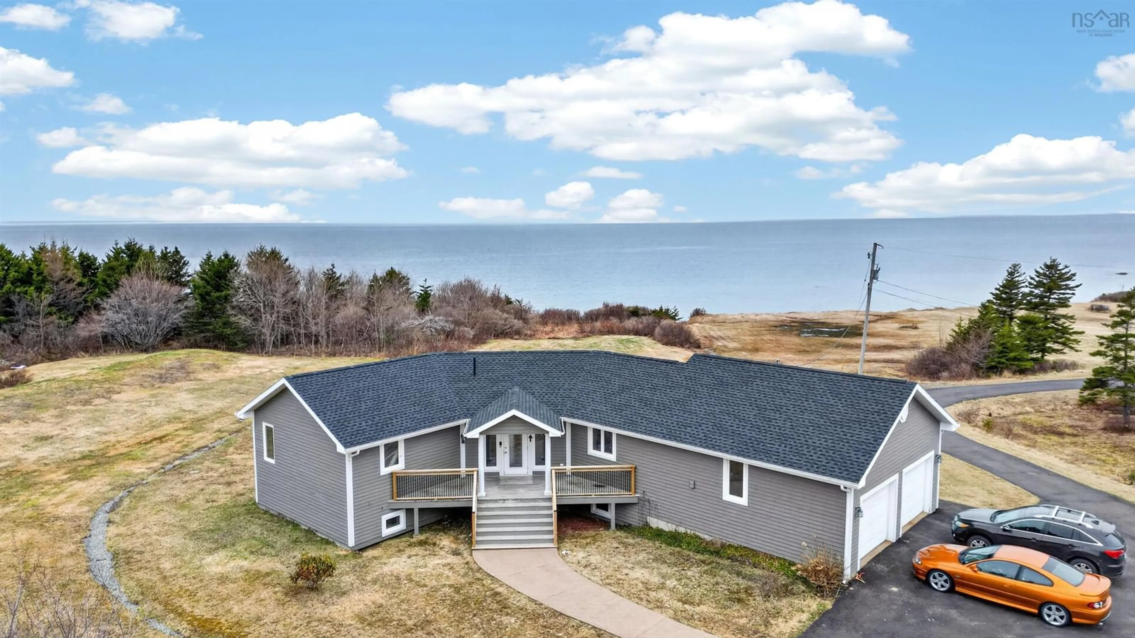 A pic from outside/outdoor area/front of a property/back of a property/a pic from drone, water/lake/river/ocean view for 3599 Highway 19, Long Point Nova Scotia B0E 1P0