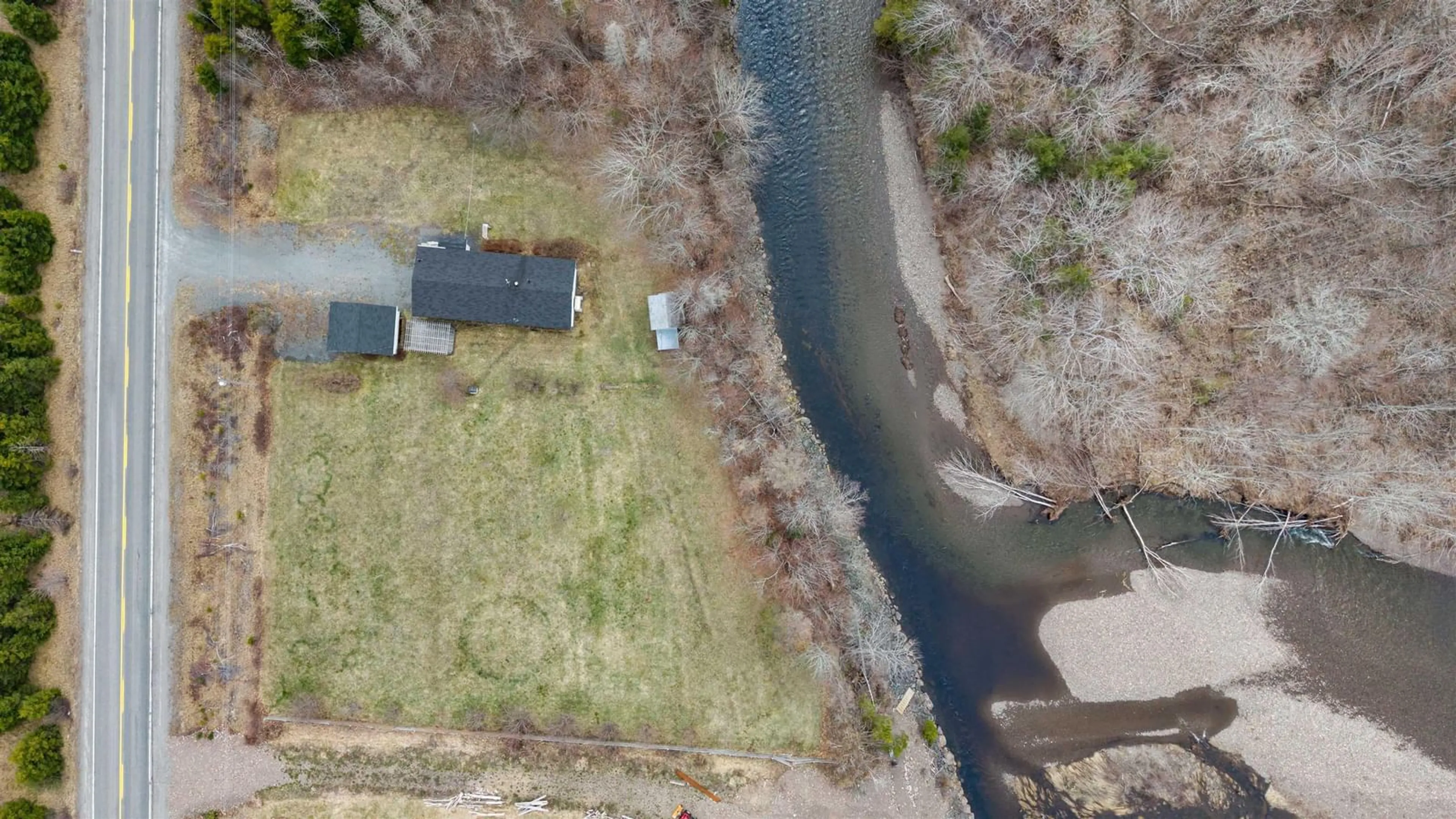 A pic from outside/outdoor area/front of a property/back of a property/a pic from drone, water/lake/river/ocean view for 2135 Highway 336, Eastville Nova Scotia B0N 2P0