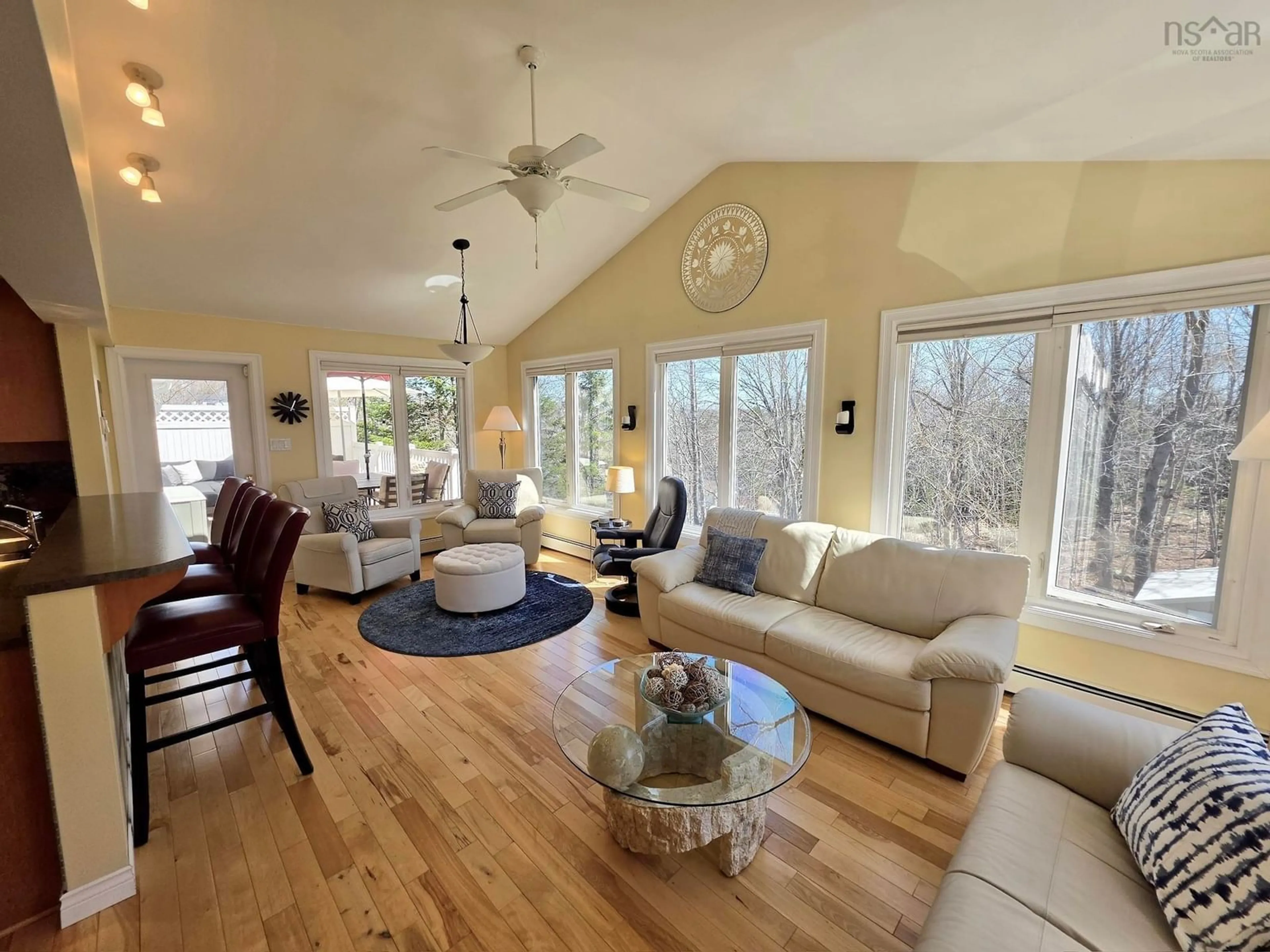 Living room with furniture, wood/laminate floor for 3 Beech St, Bedford Nova Scotia B4A 1T1