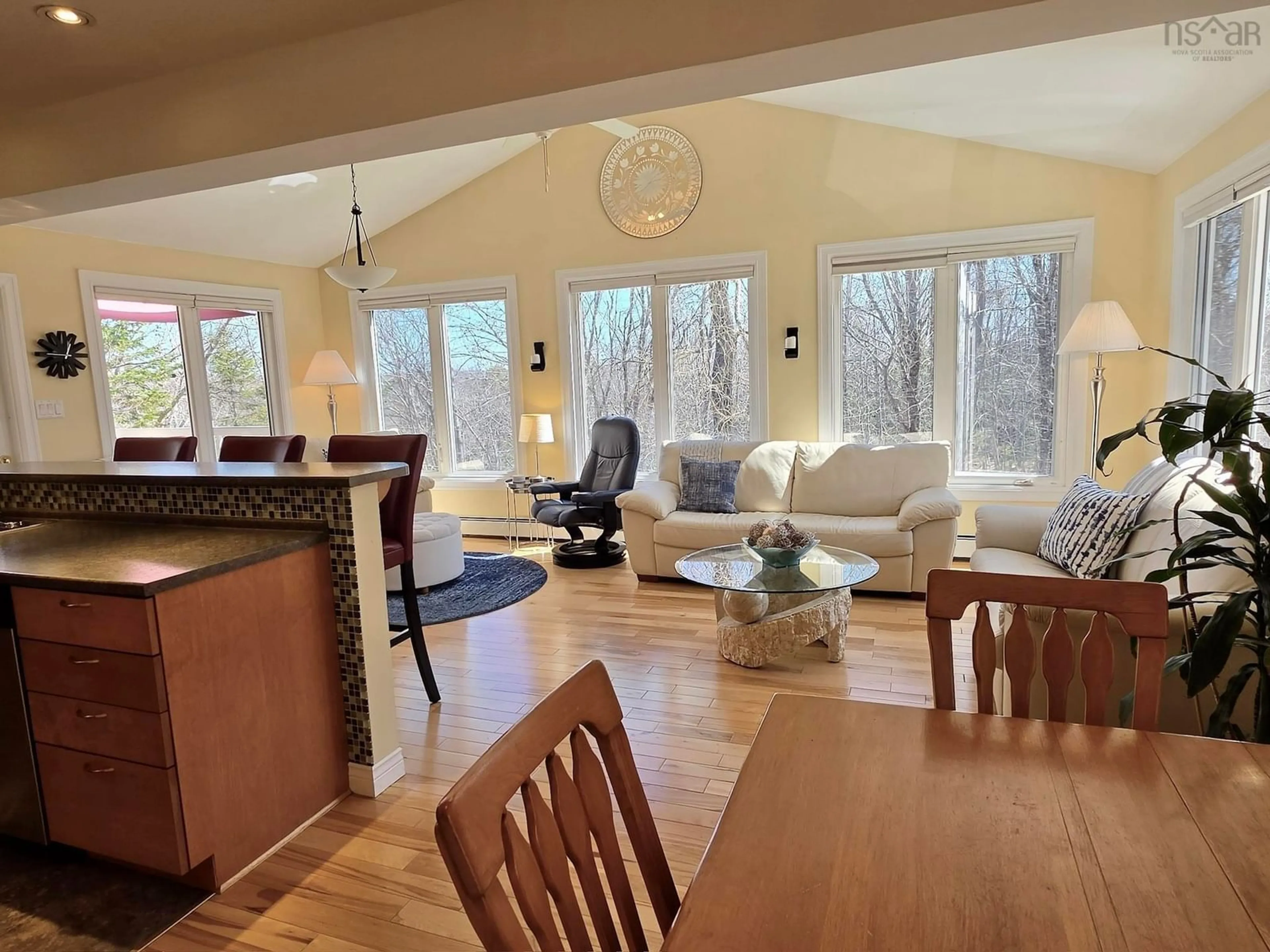 Living room with furniture, wood/laminate floor for 3 Beech St, Bedford Nova Scotia B4A 1T1