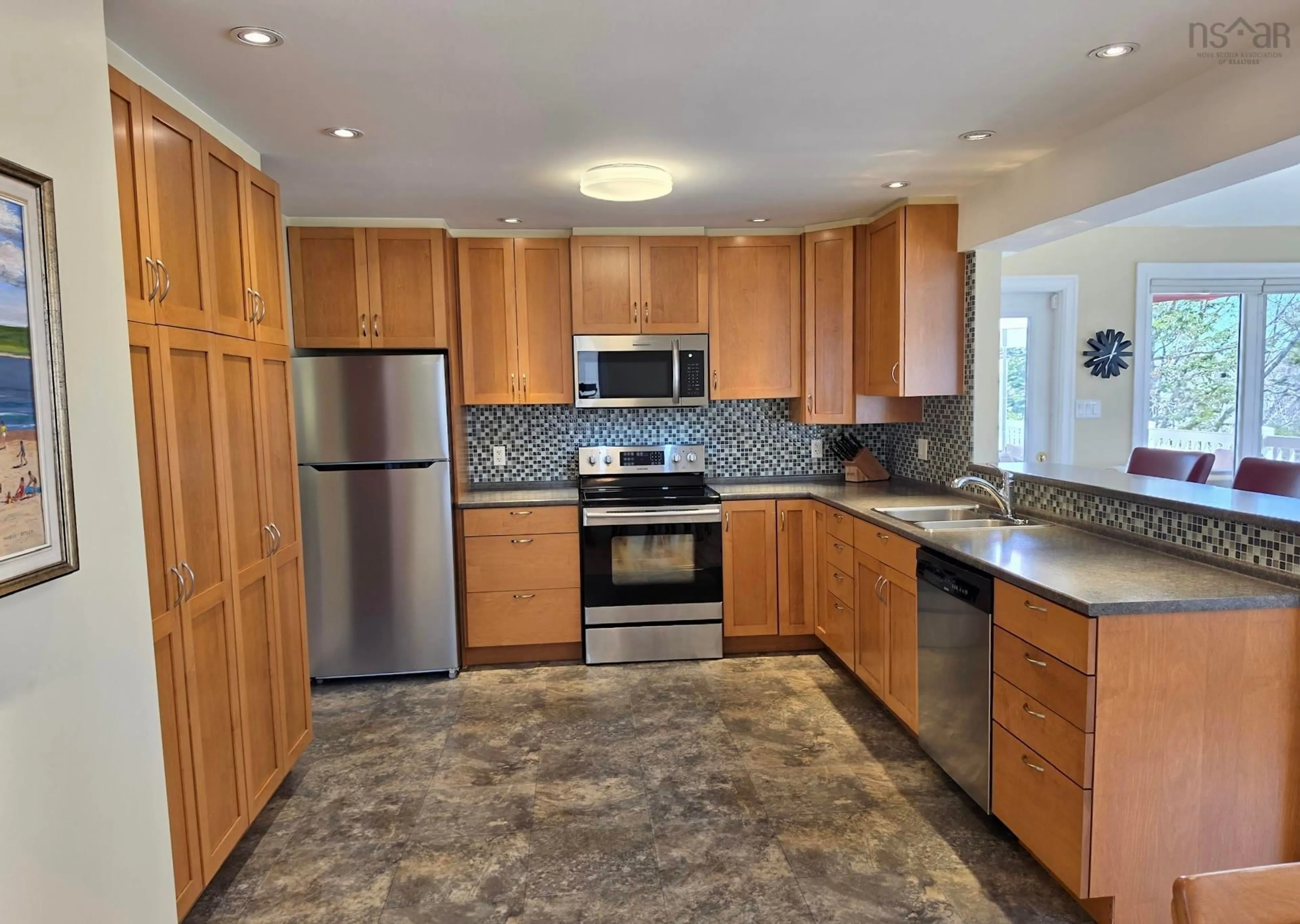 Open concept kitchen, ceramic/tile floor for 3 Beech St, Bedford Nova Scotia B4A 1T1