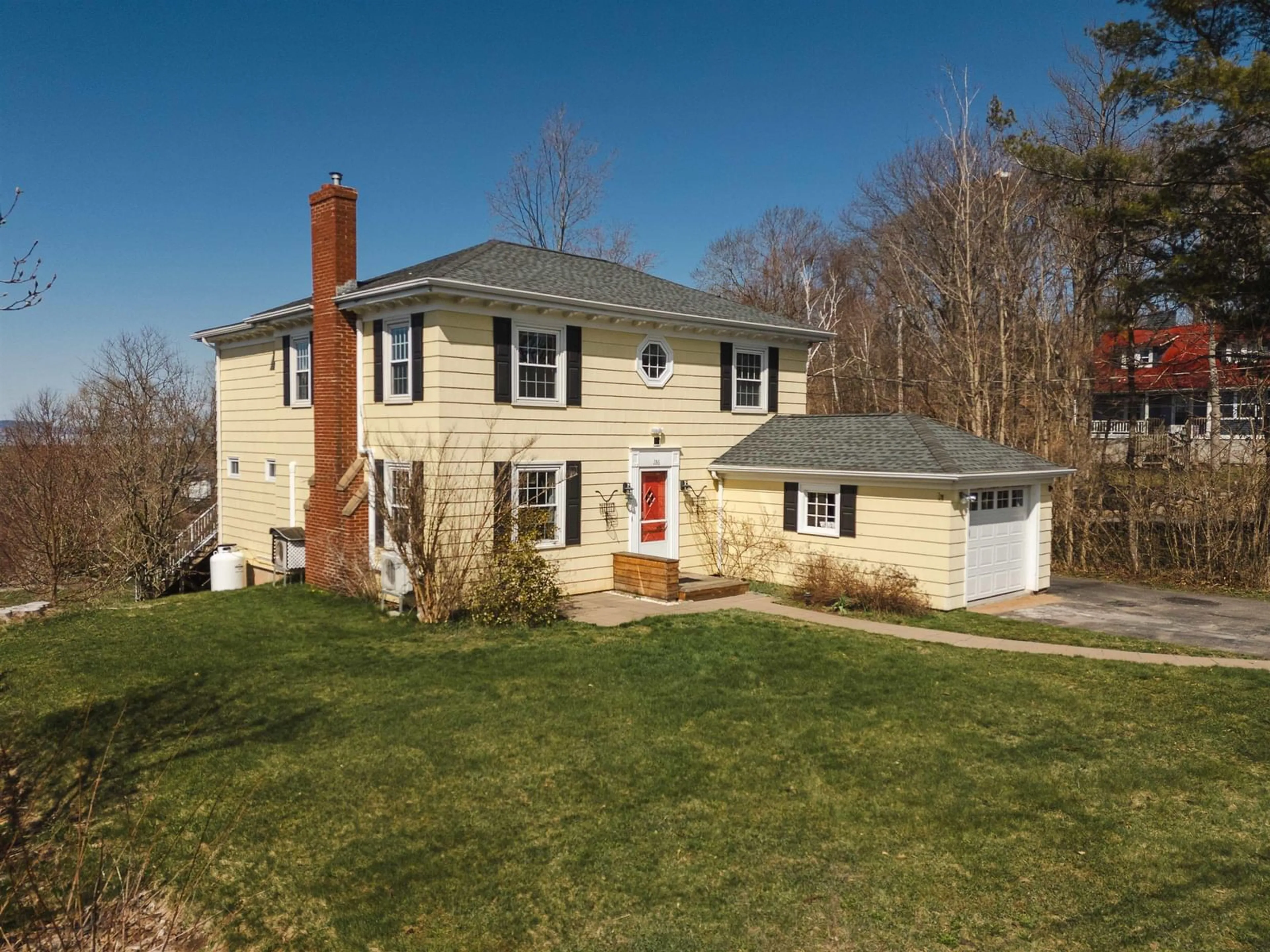 Home with vinyl exterior material, street for 186 Main St, Wolfville Nova Scotia B4P 1C4