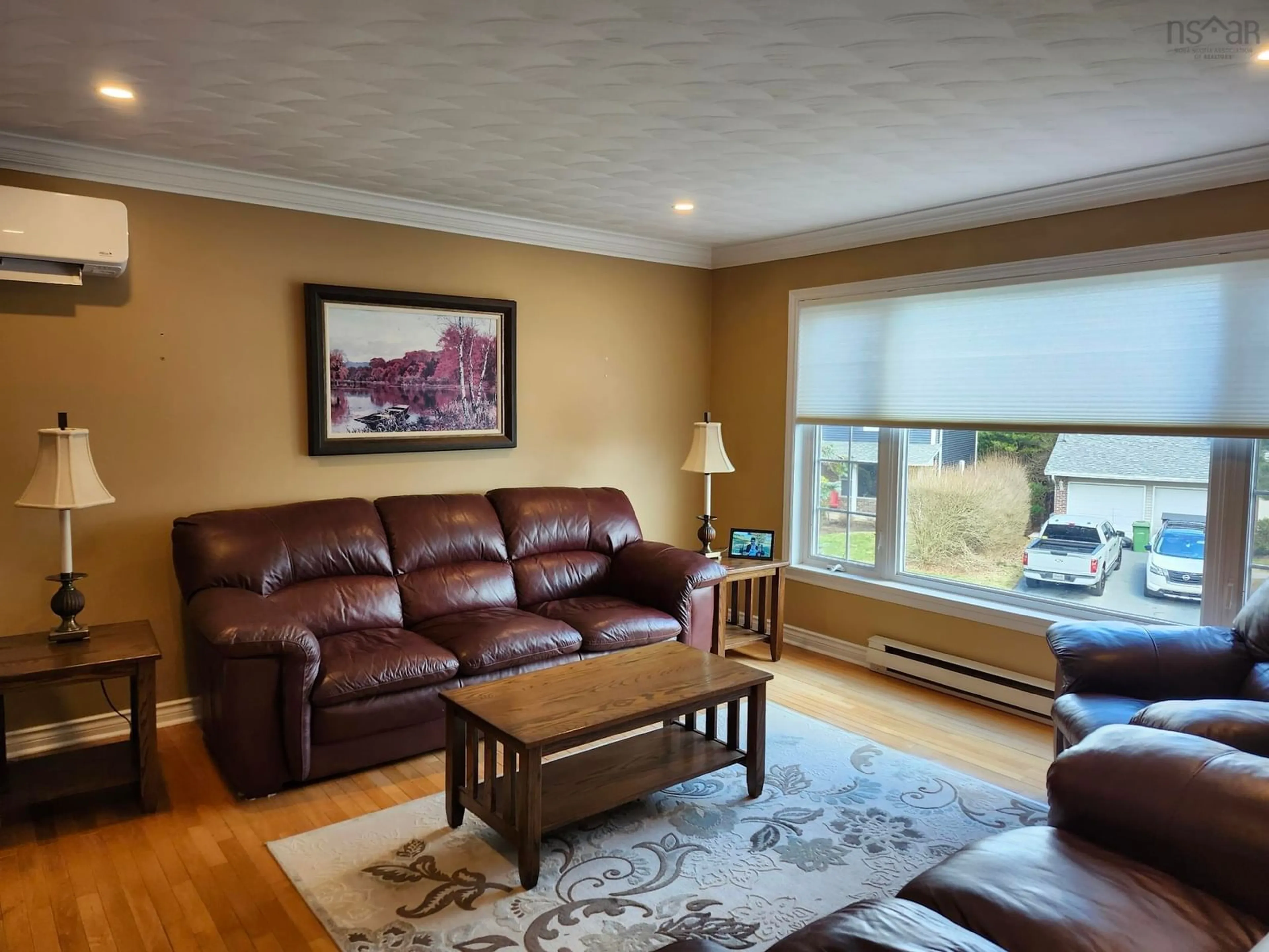 Living room with furniture, wood/laminate floor for 36 Horizon Rd, Bedford Nova Scotia B4A 3N1