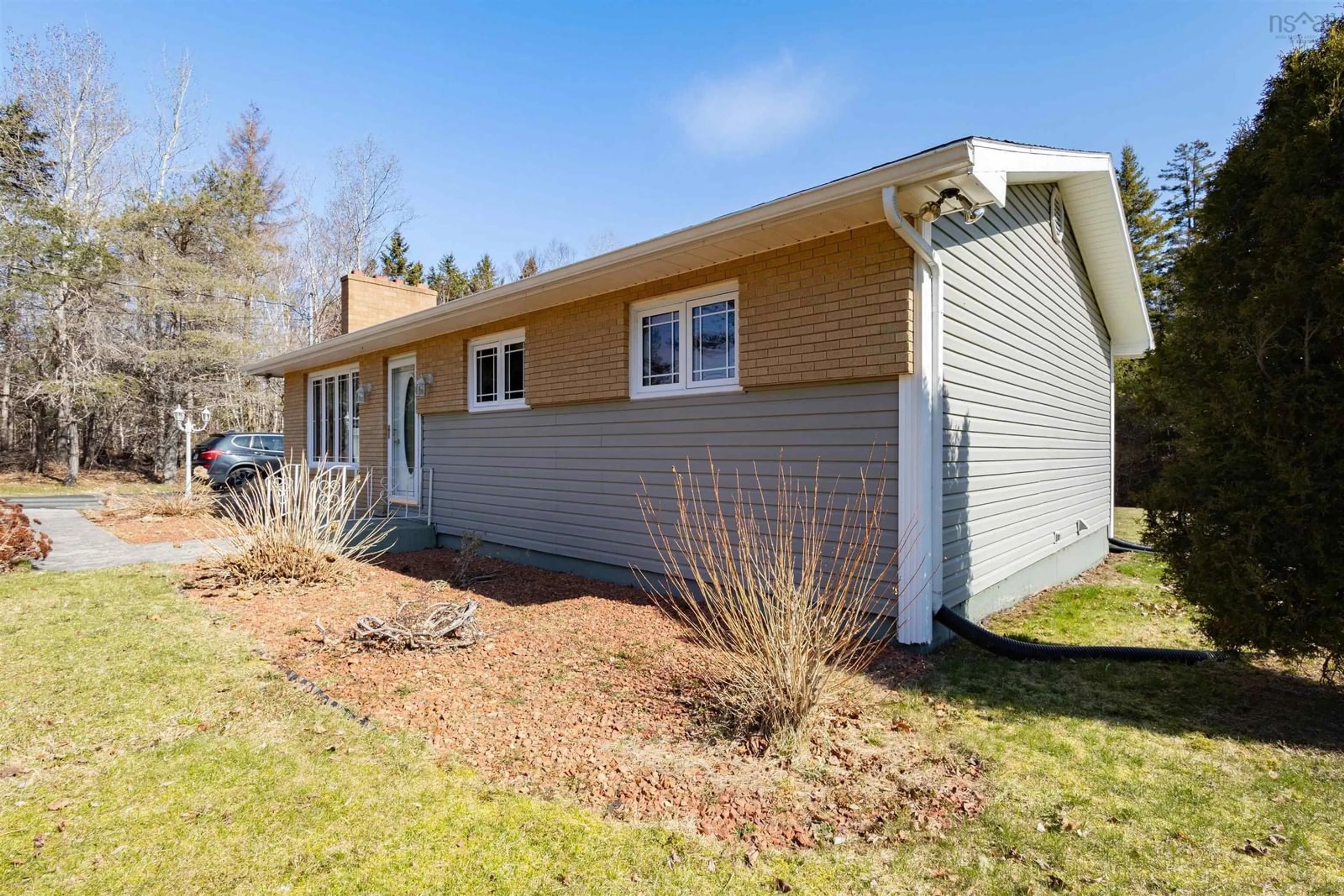 Home with vinyl exterior material, street for Hts, Sydney Nova Scotia B1L 1G9