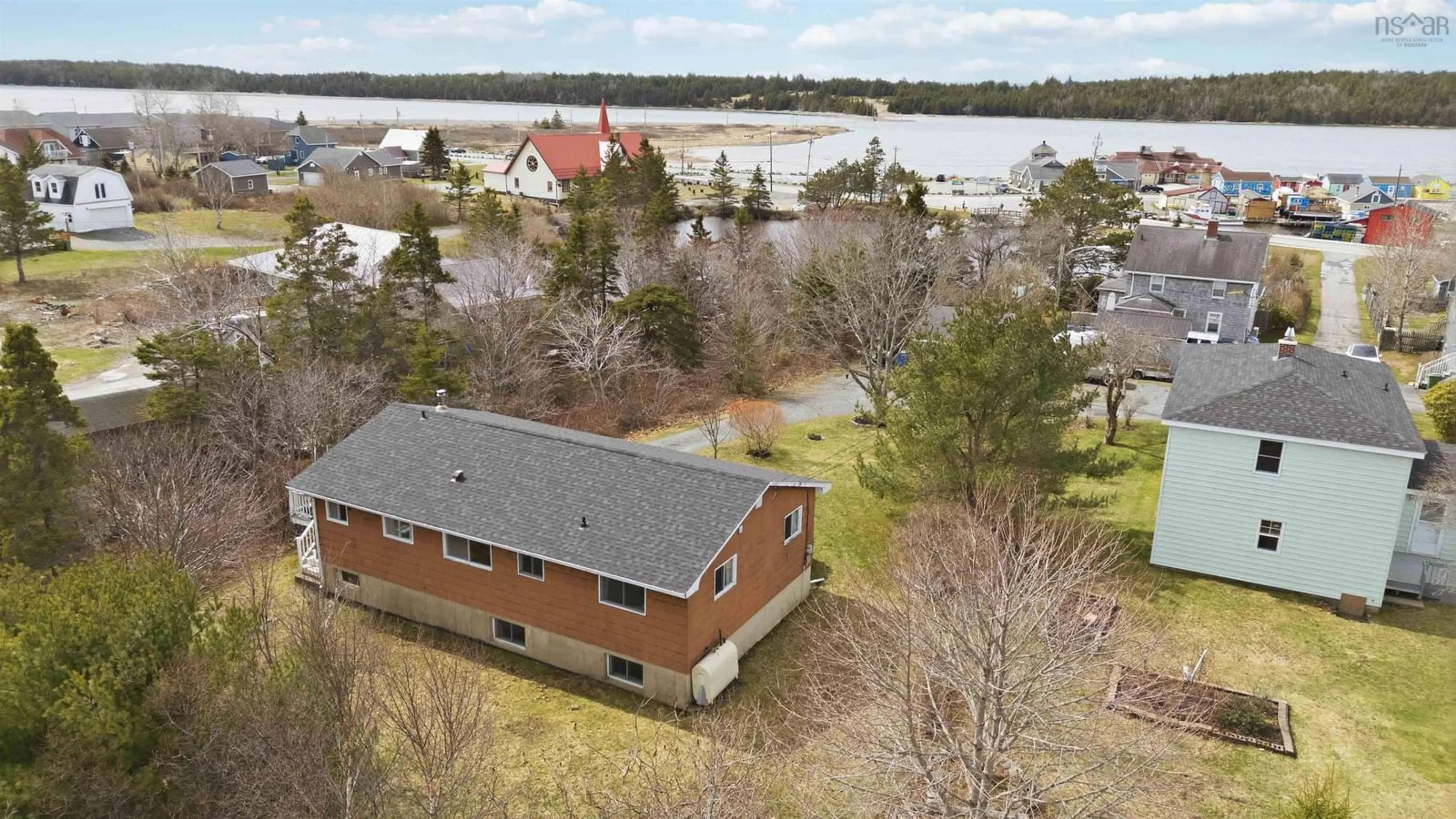 A pic from outside/outdoor area/front of a property/back of a property/a pic from drone, water/lake/river/ocean view for 31 Francis Drive, Eastern Passage Nova Scotia B3G 1M7