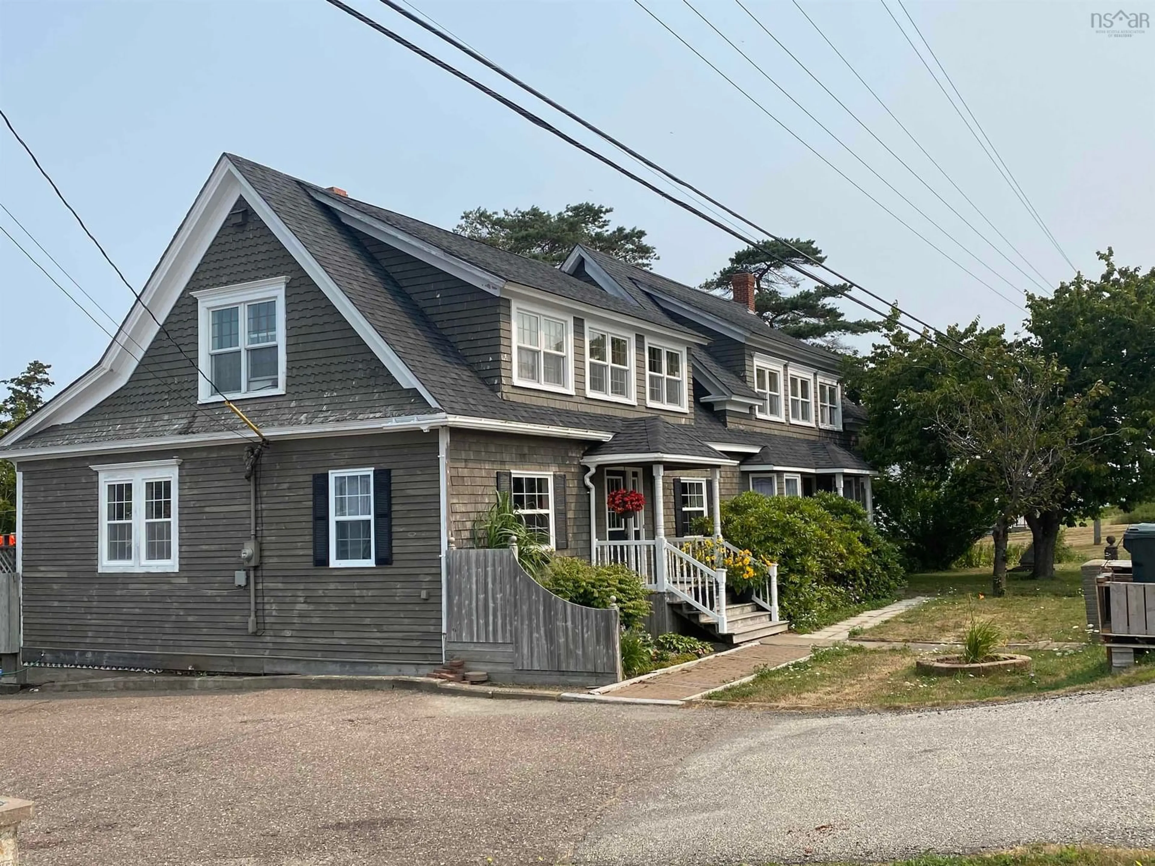A pic from outside/outdoor area/front of a property/back of a property/a pic from drone, street for 6777 Hwy 101, Gilberts Cove Nova Scotia B0W 2R0