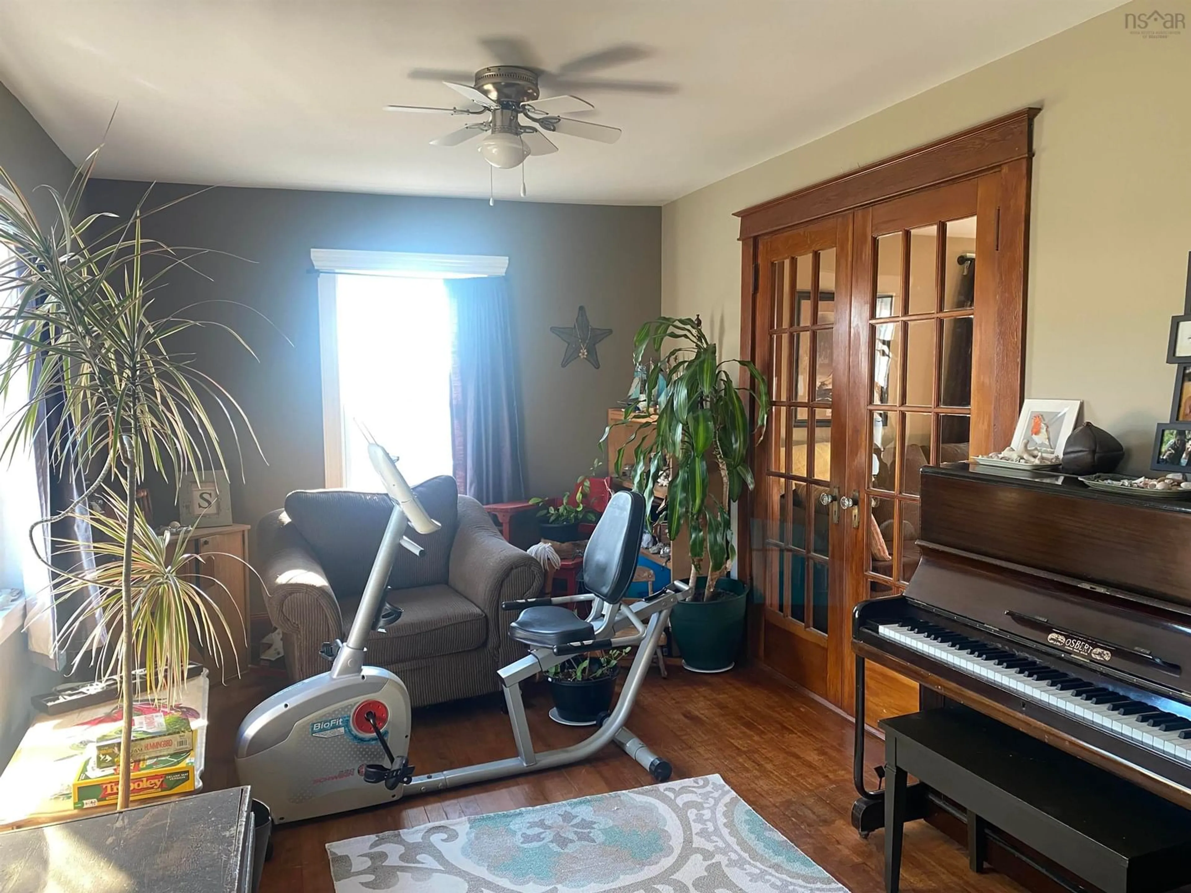 Living room with furniture, wood/laminate floor for 6777 Hwy 101, Gilberts Cove Nova Scotia B0W 2R0