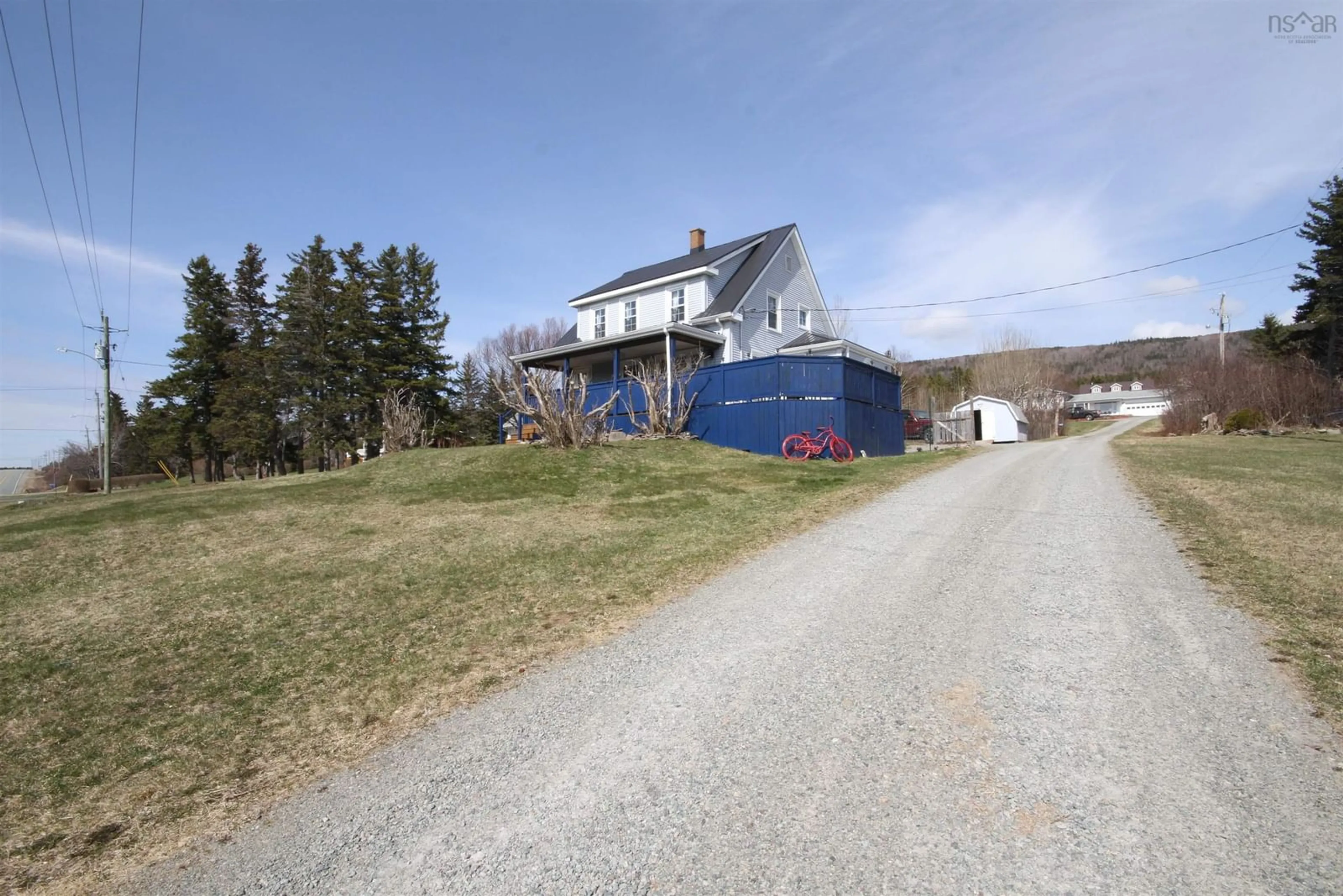 A pic from outside/outdoor area/front of a property/back of a property/a pic from drone, street for 1922 Highway 19, Creignish Nova Scotia B9A 1C3