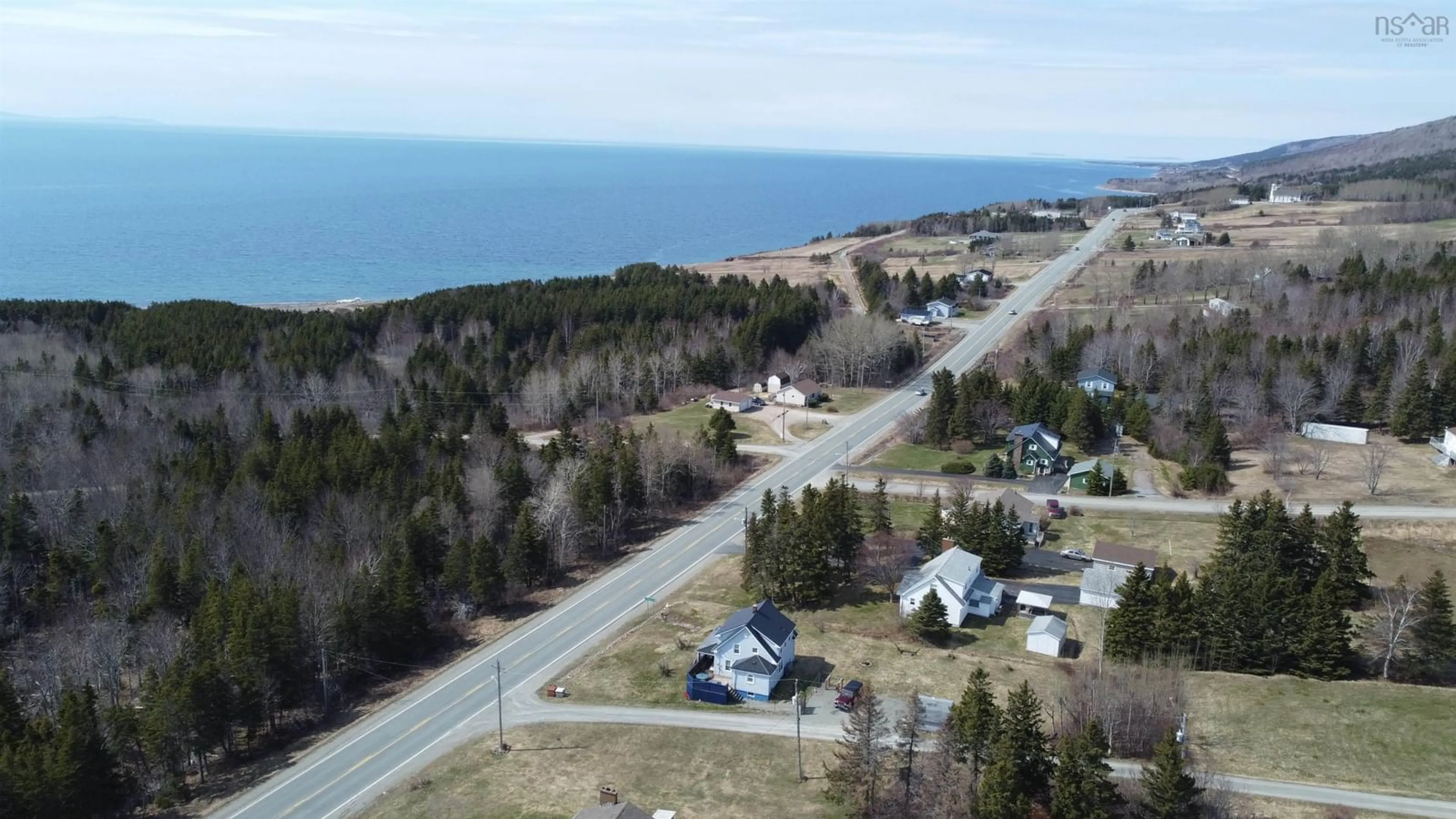 A pic from outside/outdoor area/front of a property/back of a property/a pic from drone, water/lake/river/ocean view for 1922 Highway 19, Creignish Nova Scotia B9A 1C3