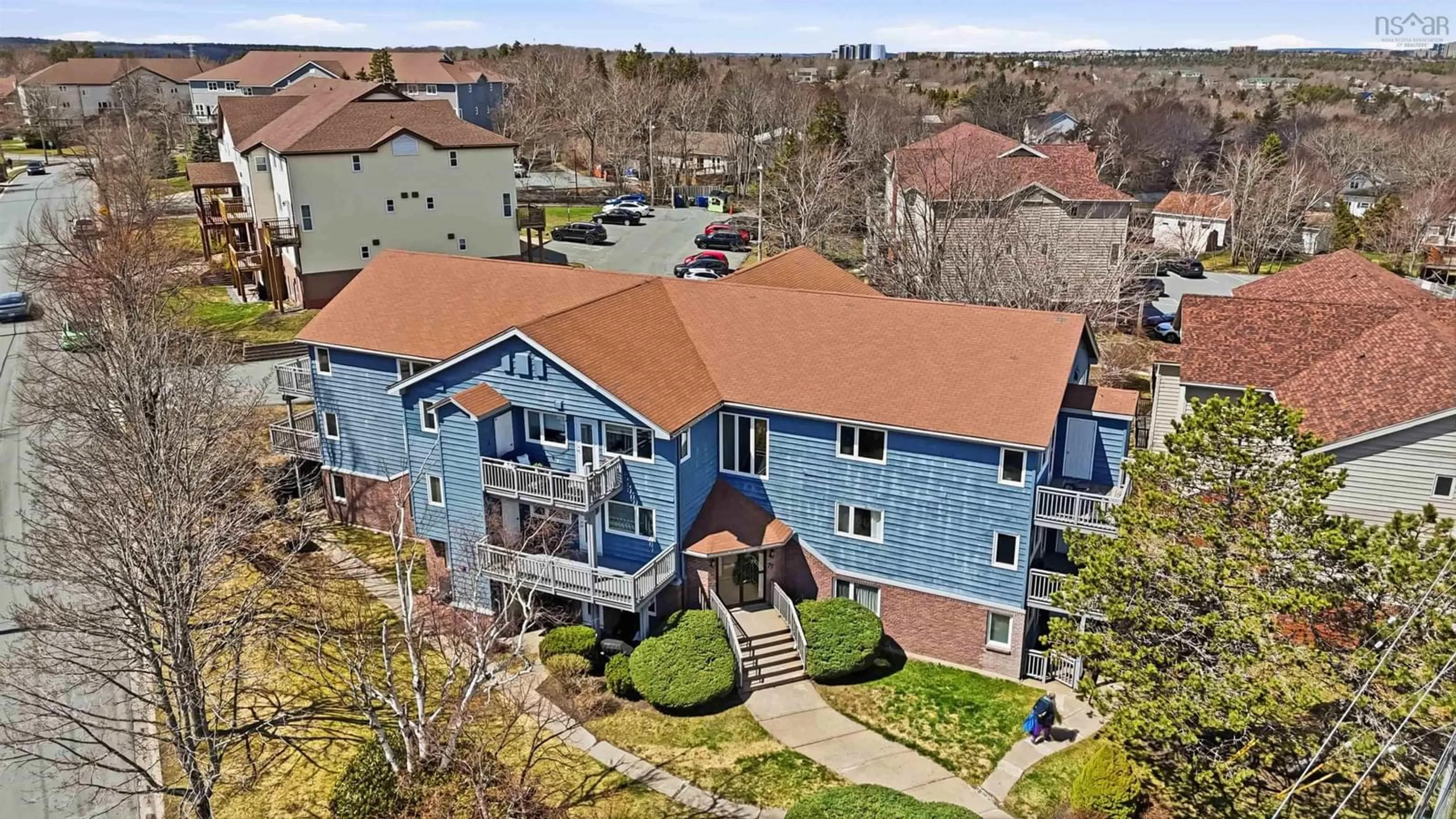 A pic from outside/outdoor area/front of a property/back of a property/a pic from drone, building for 77 Farnham Gate Rd #2, Halifax Nova Scotia B3M 4A5