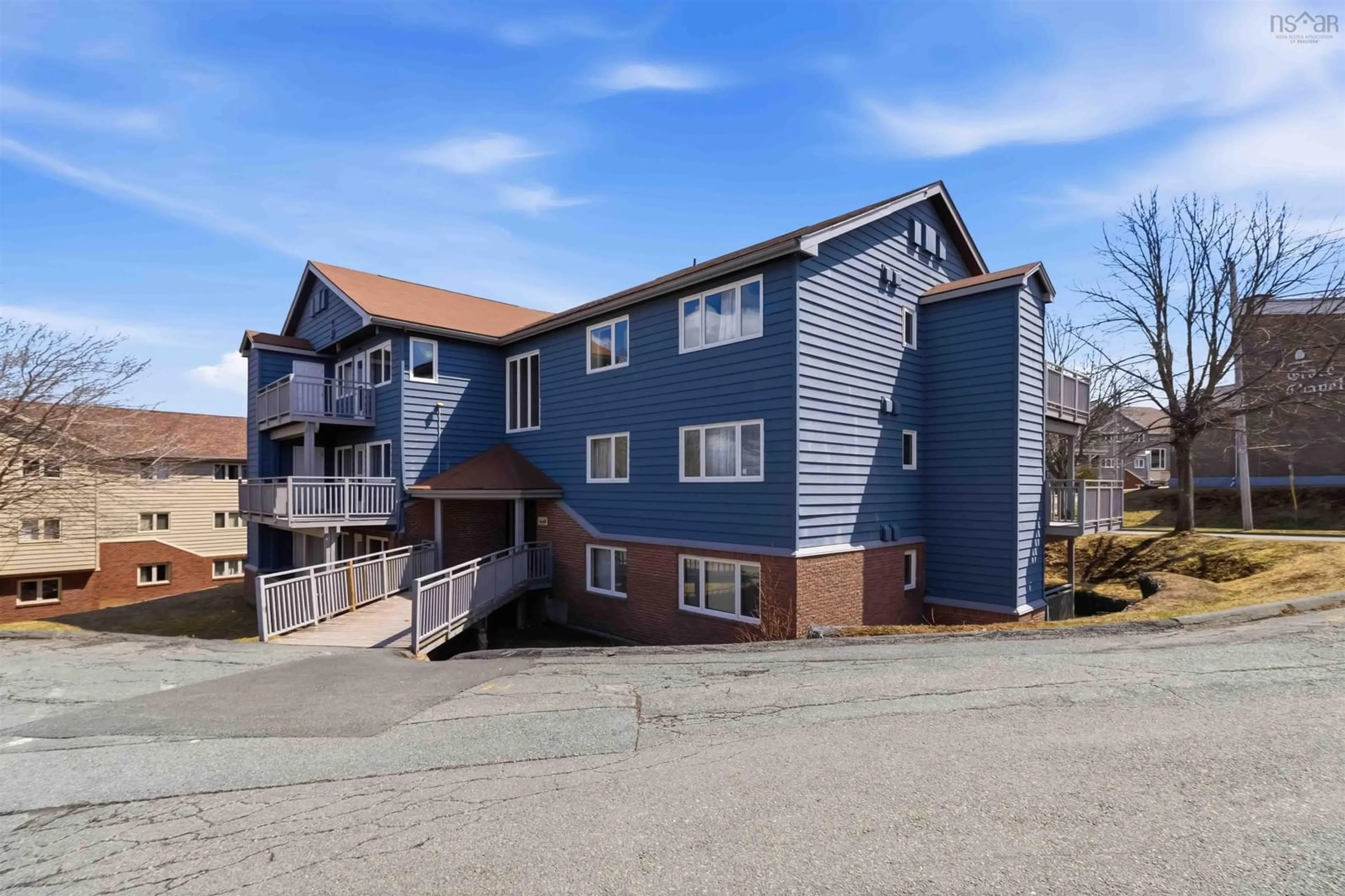 A pic from outside/outdoor area/front of a property/back of a property/a pic from drone, unknown for 77 Farnham Gate Rd #2, Halifax Nova Scotia B3M 4A5