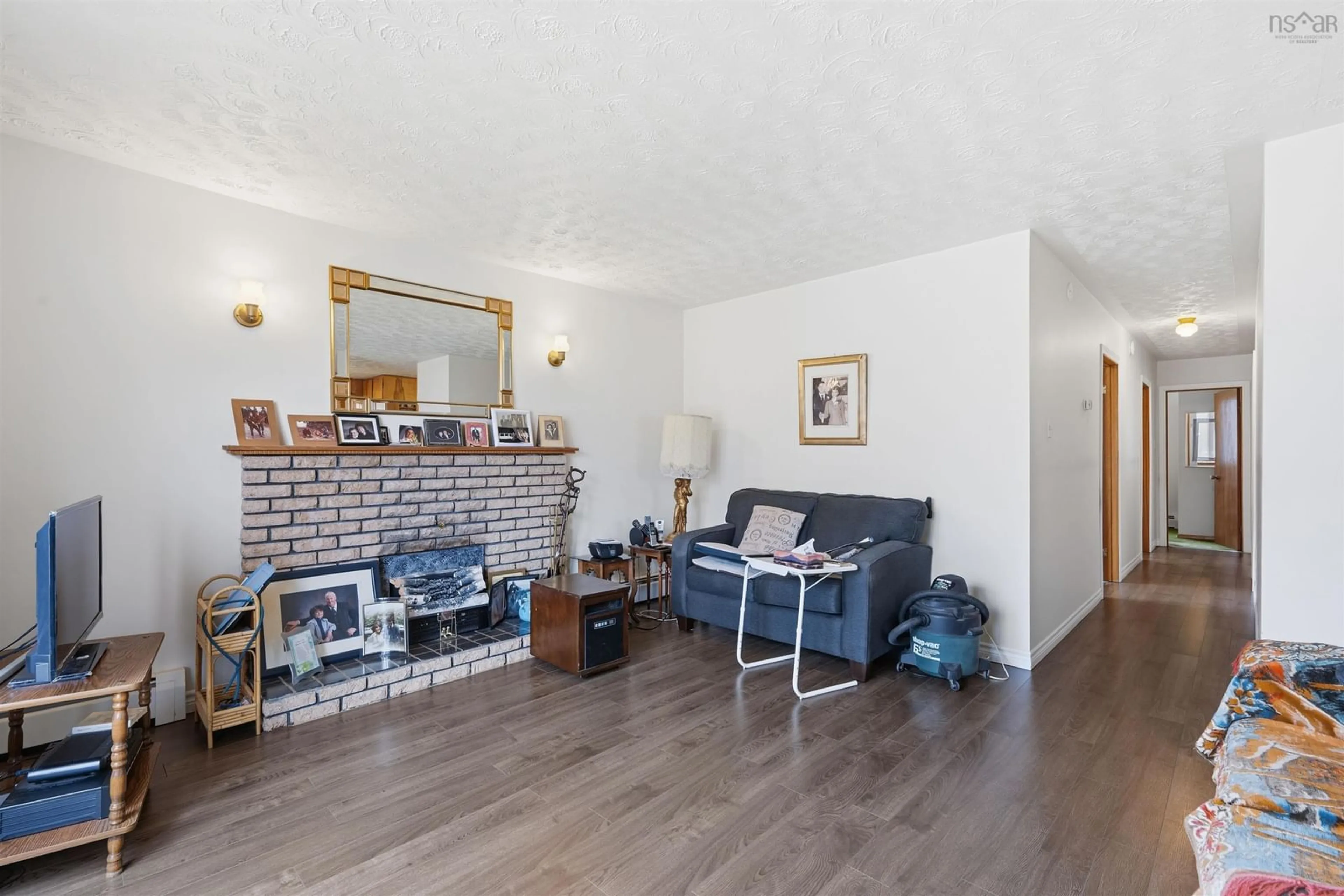 Living room with furniture, wood/laminate floor for 8 Polara Dr, Lower Sackville Nova Scotia B4C 2B6