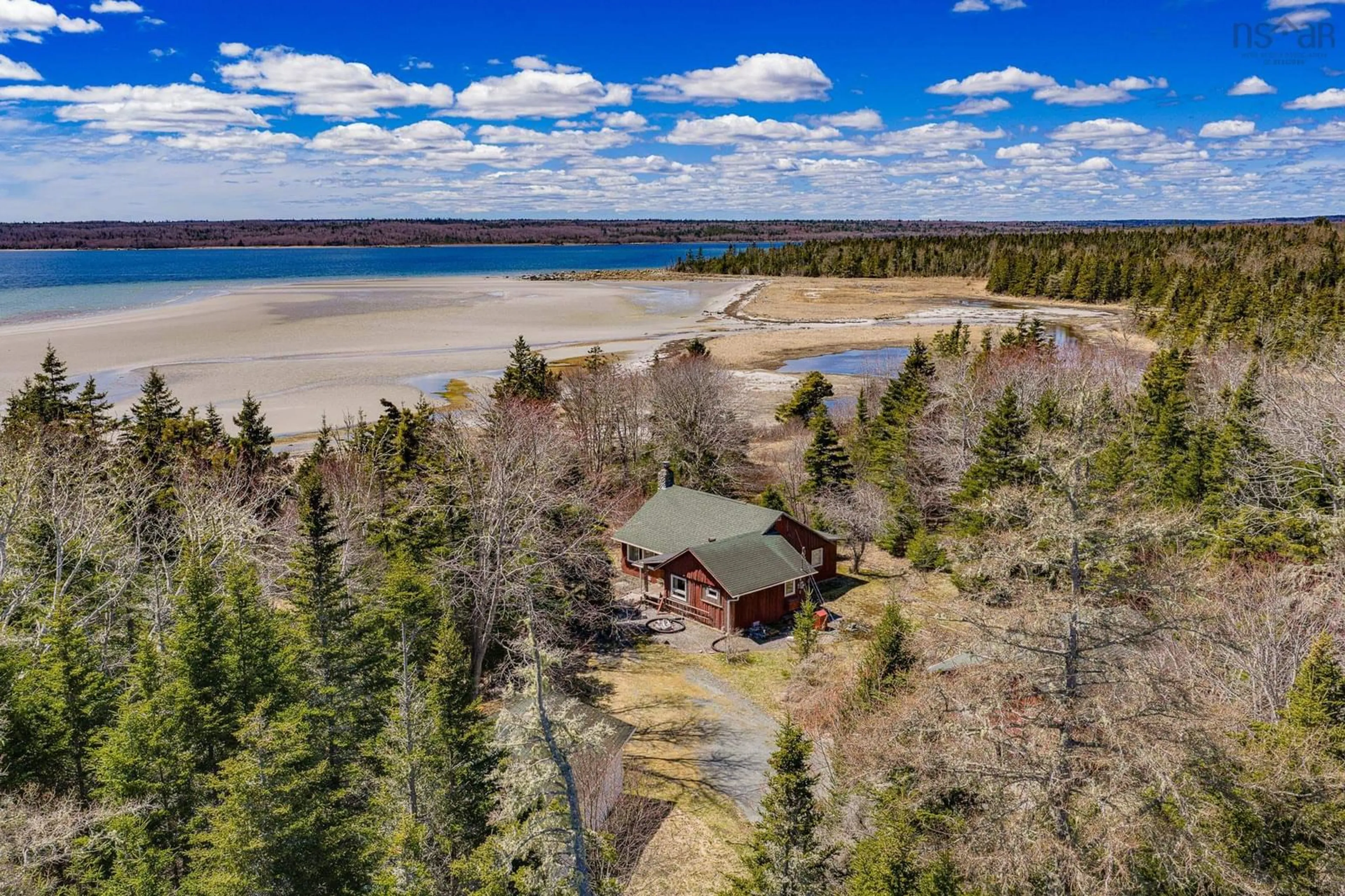 A pic from outside/outdoor area/front of a property/back of a property/a pic from drone, water/lake/river/ocean view for 382 Saint Catherines River Rd, Port Joli Nova Scotia B0T 1S0