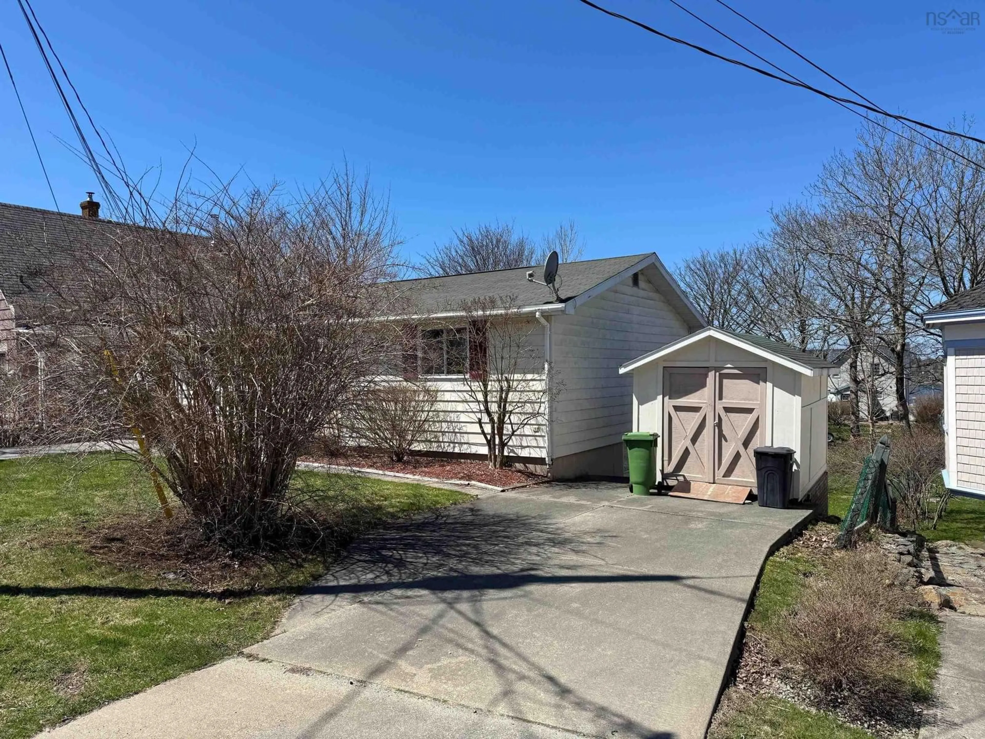 A pic from outside/outdoor area/front of a property/back of a property/a pic from drone, street for 5 Whipple St, Yarmouth Nova Scotia B5A 1W3