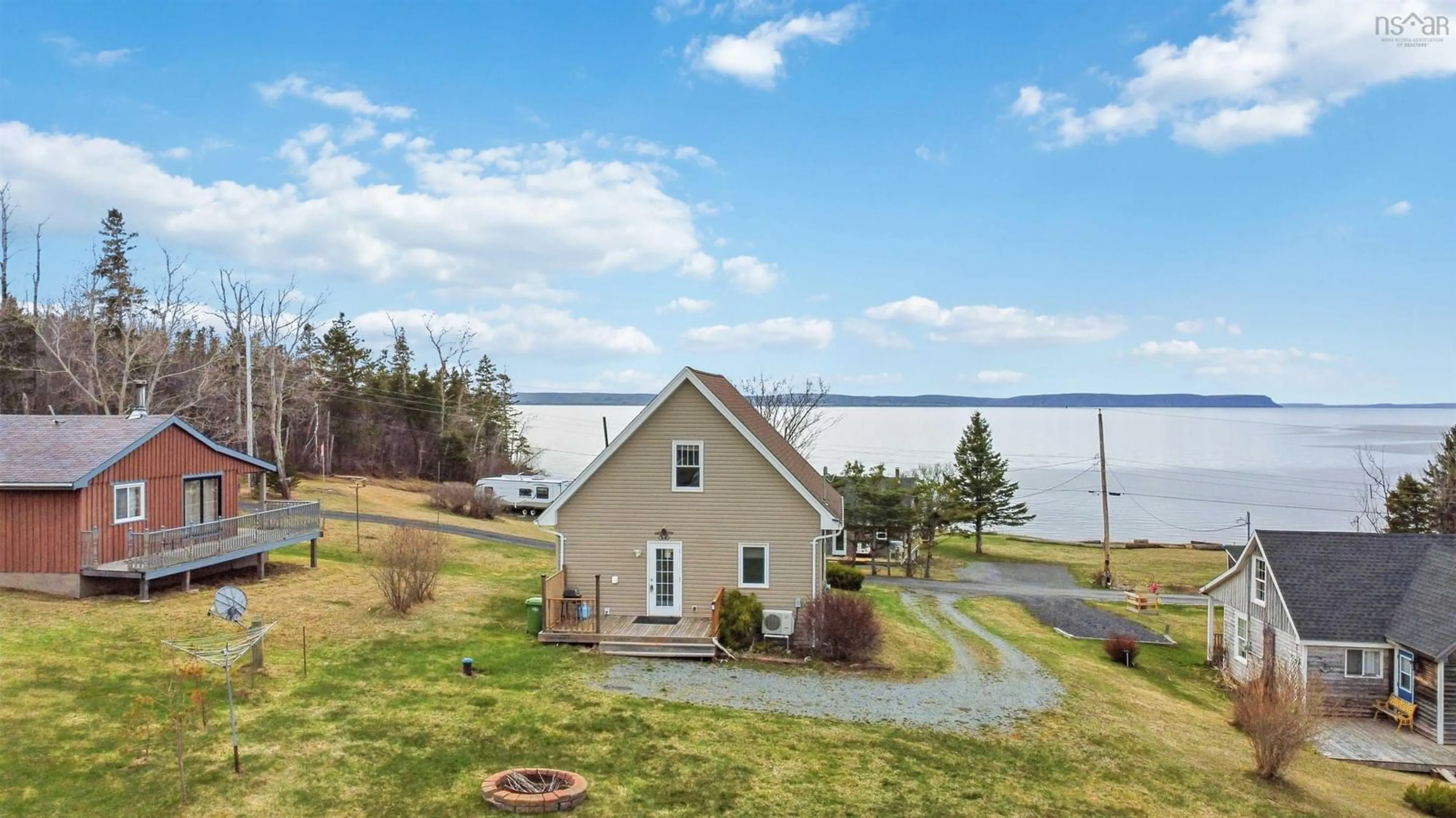 A pic from outside/outdoor area/front of a property/back of a property/a pic from drone, water/lake/river/ocean view for 39 Blomidon View Lane, Bramber Nova Scotia B0N 2R0
