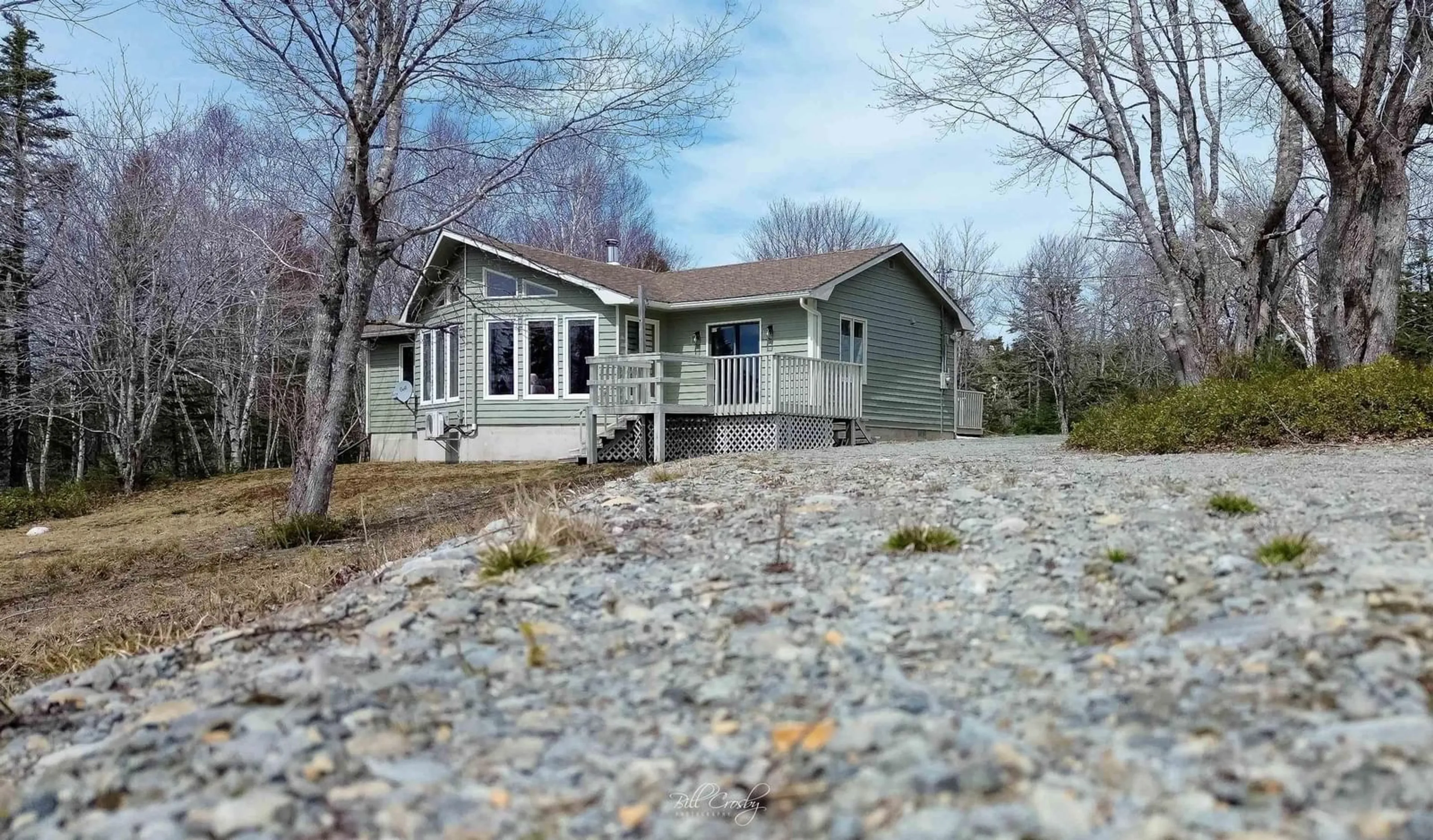 A pic from outside/outdoor area/front of a property/back of a property/a pic from drone, unknown for 57 Somerset Dr, East Sable River Nova Scotia B0T 1V0