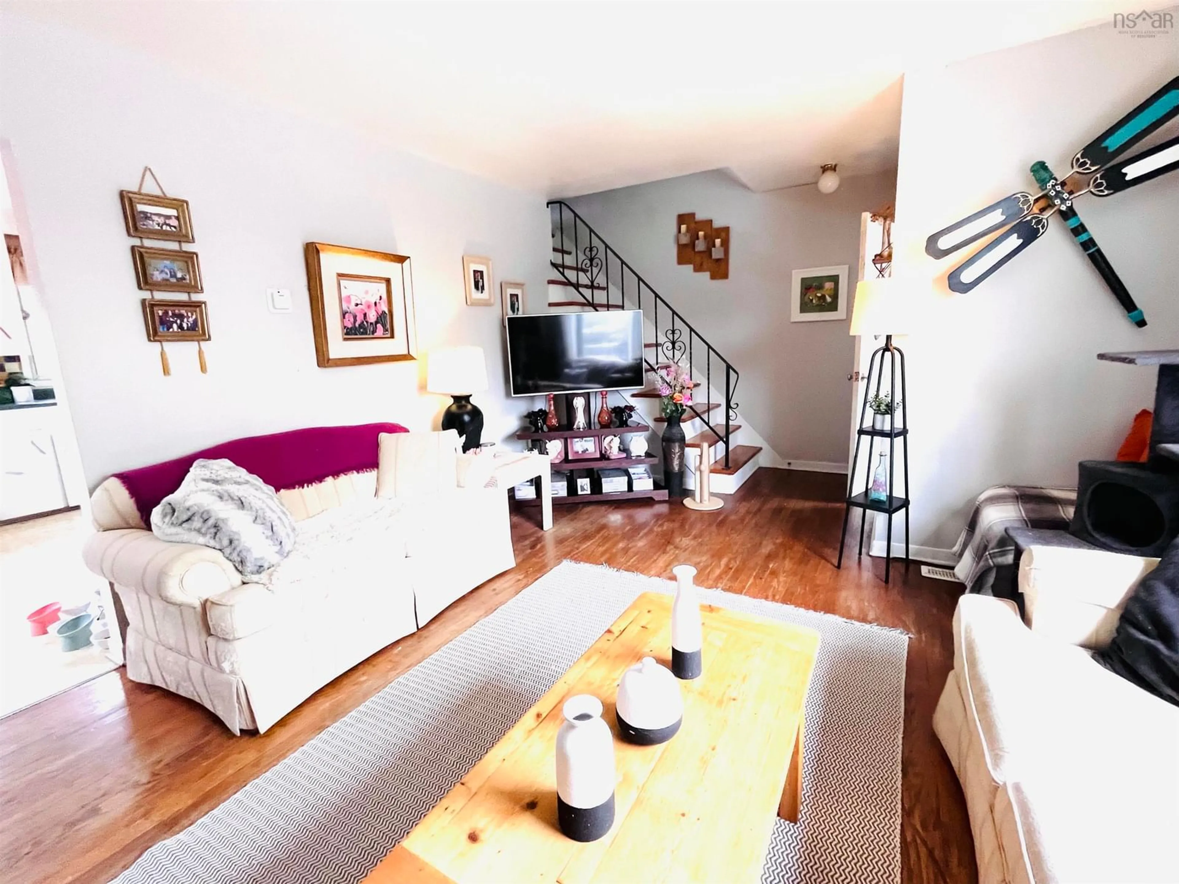 Living room with furniture, wood/laminate floor for 84 Williams Lake Rd #A B, Armdale Nova Scotia B3P 1T3